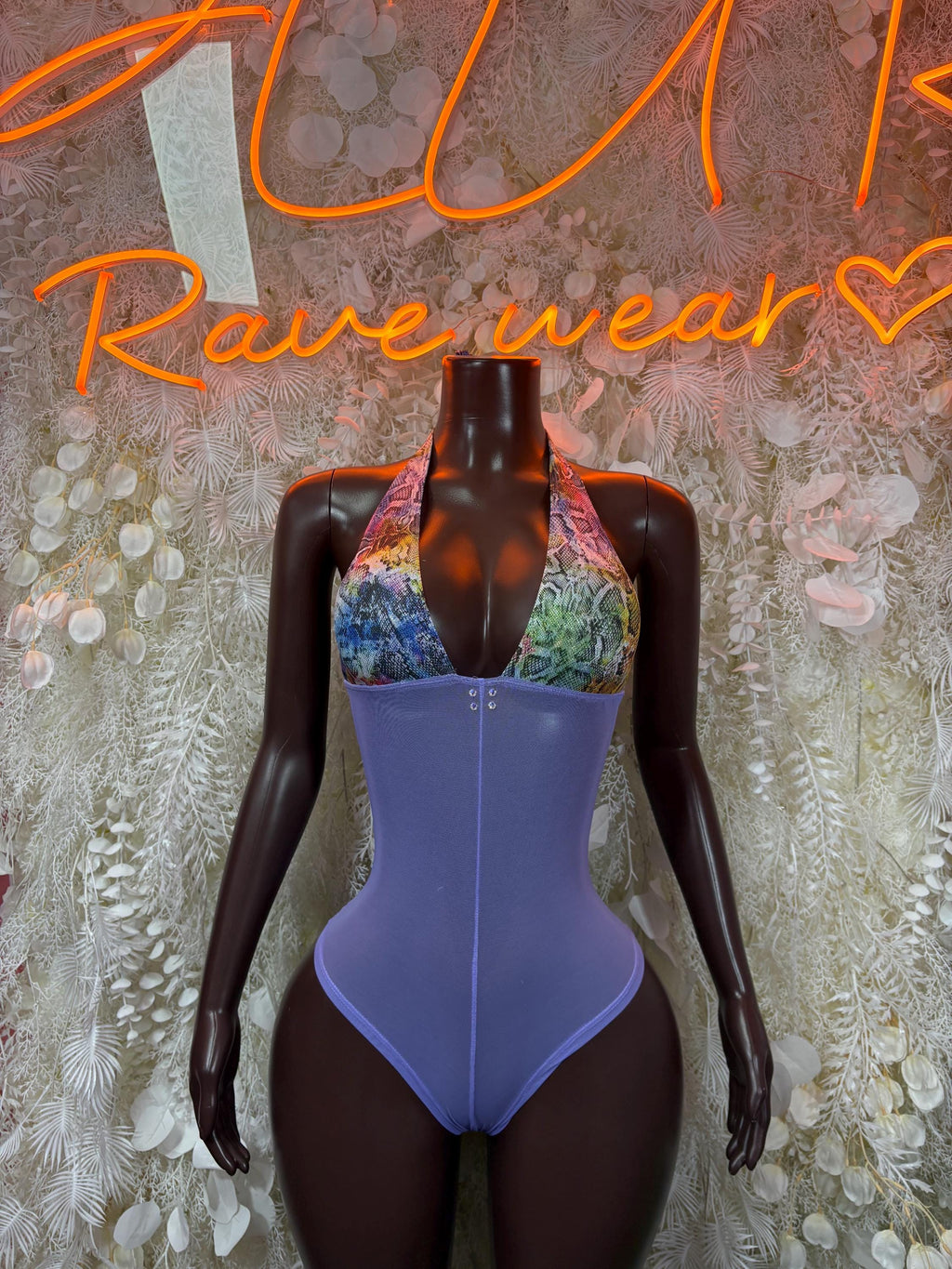 Purple one-piece bodysuit with V-neck and multicolor lace front panel