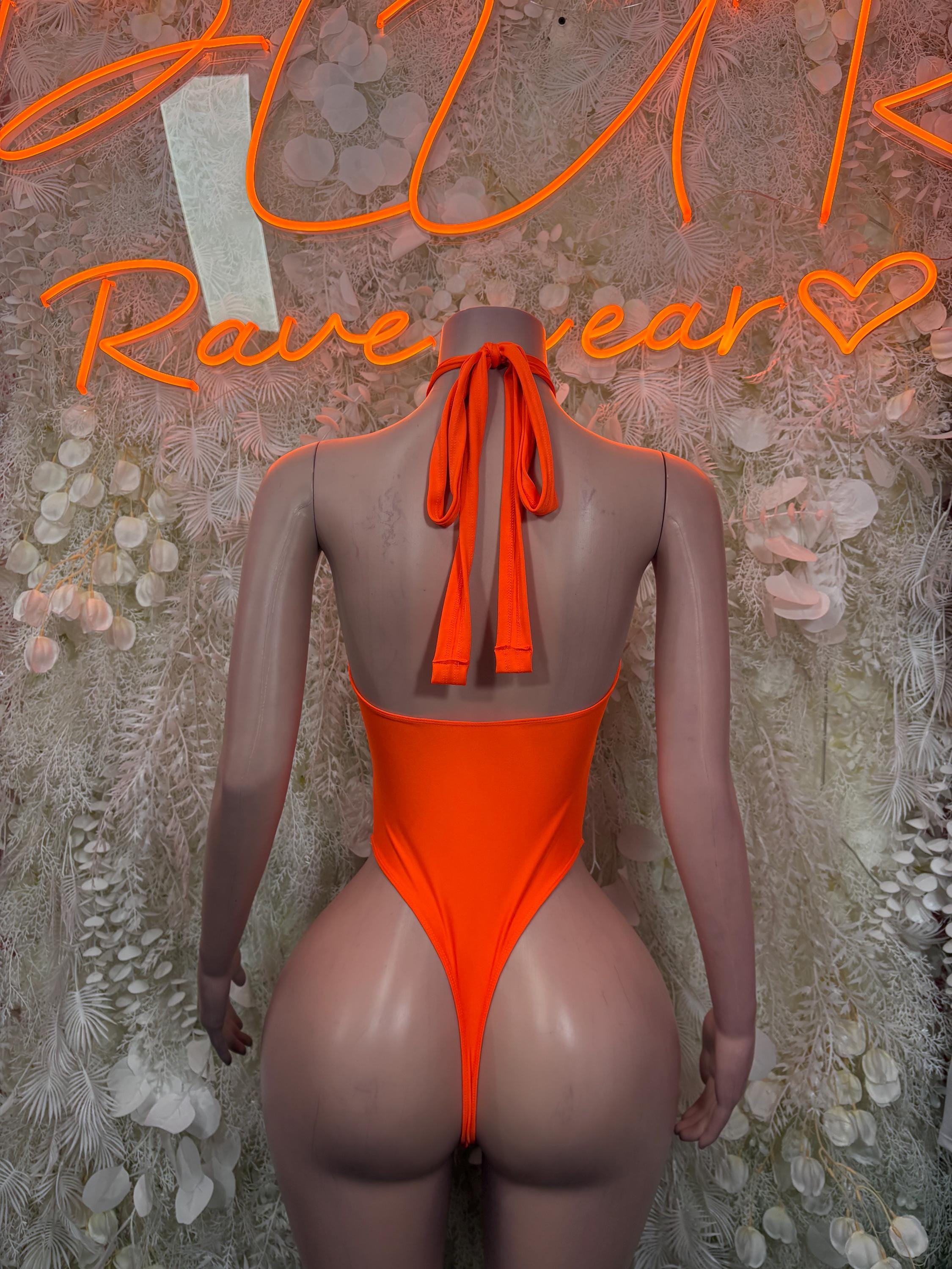 Neon orange one-piece bodysuit with halter tie strings and back cutout