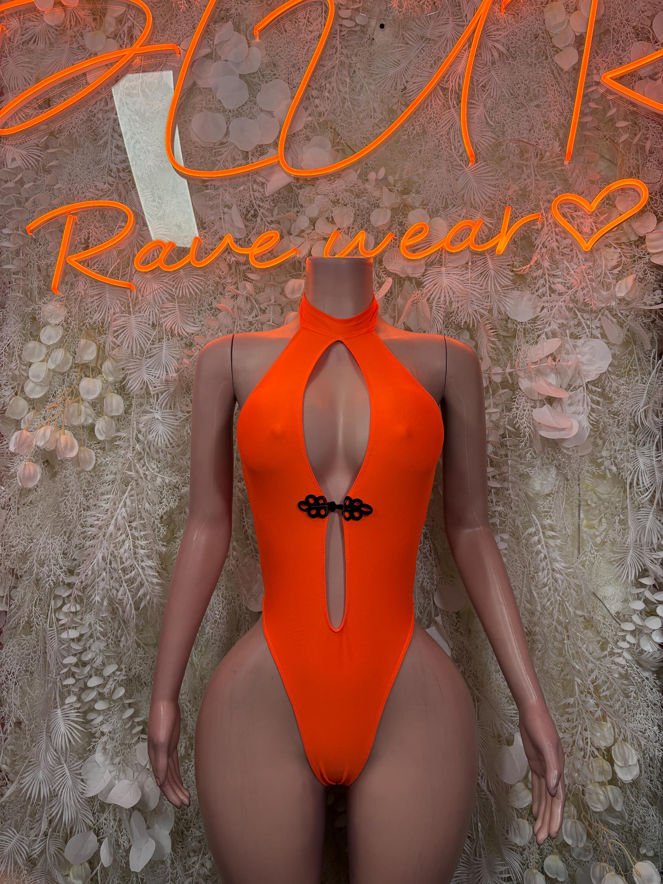 Neon orange halter one-piece bodysuit with chest keyhole cutout and black bow detail