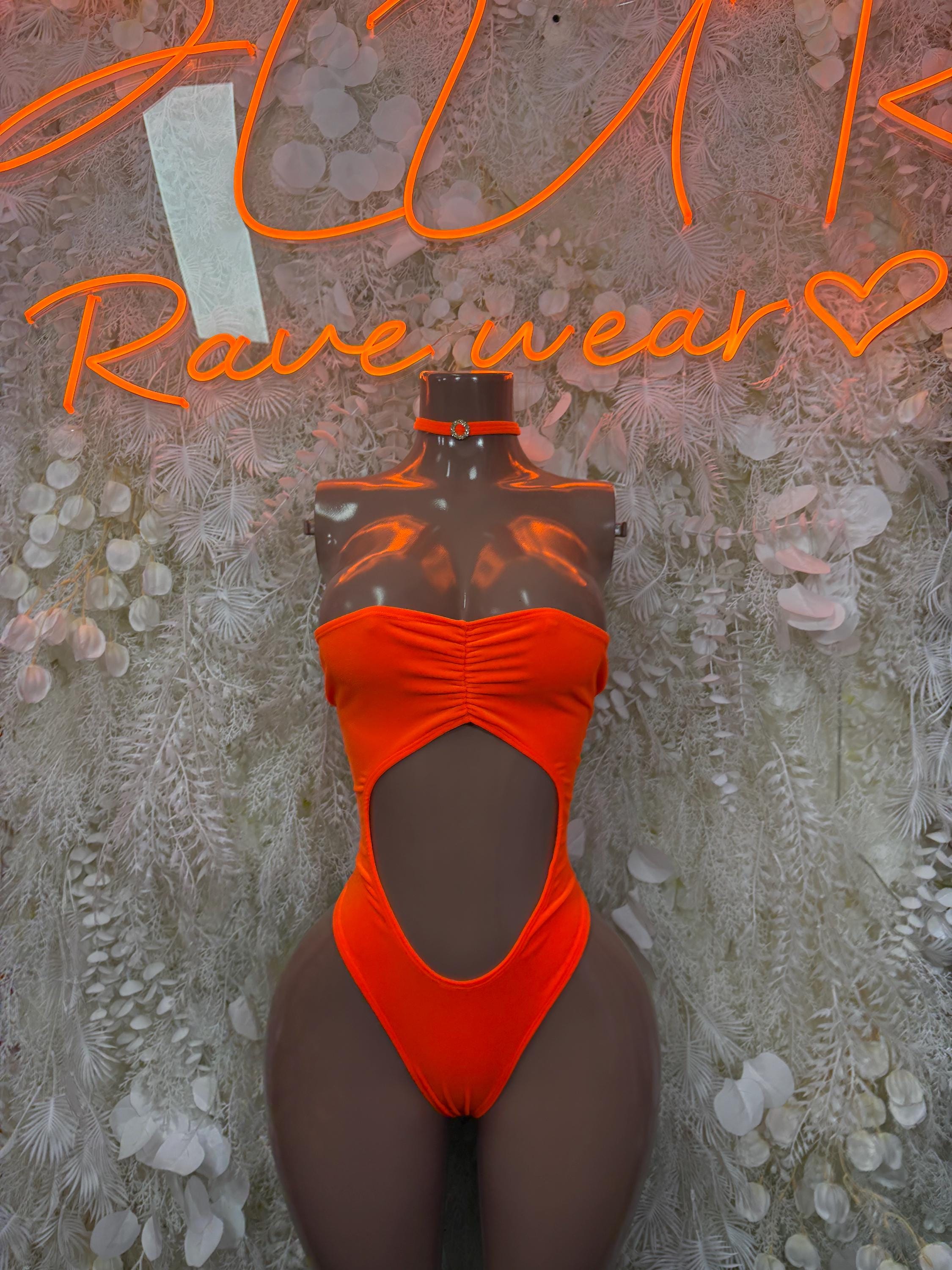 Orange one-piece bodysuit with halter neckline and draped front cutout
