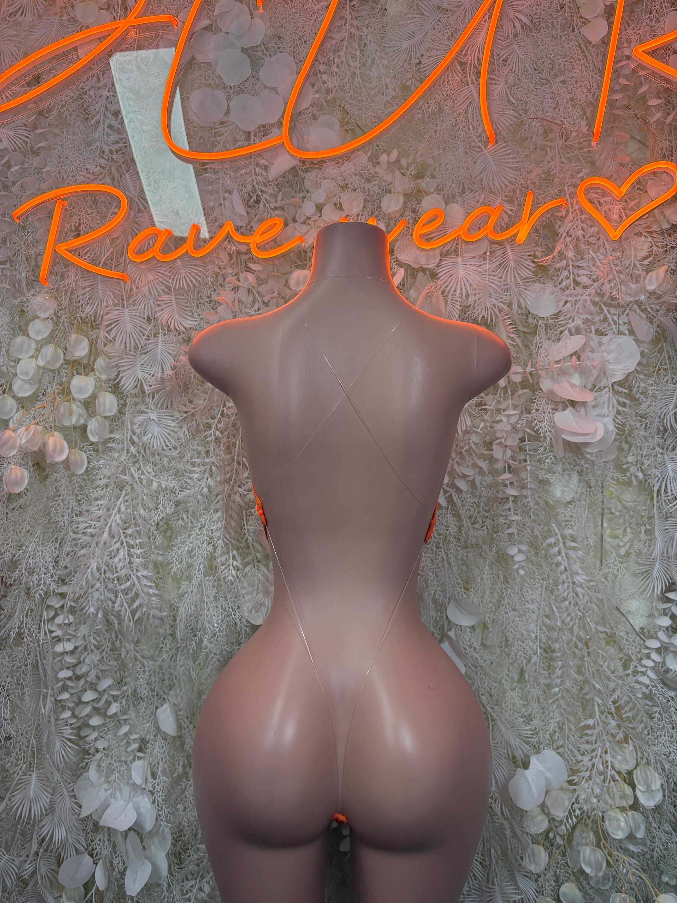 Orange mesh one-piece bodysuit with open back and low cut leg