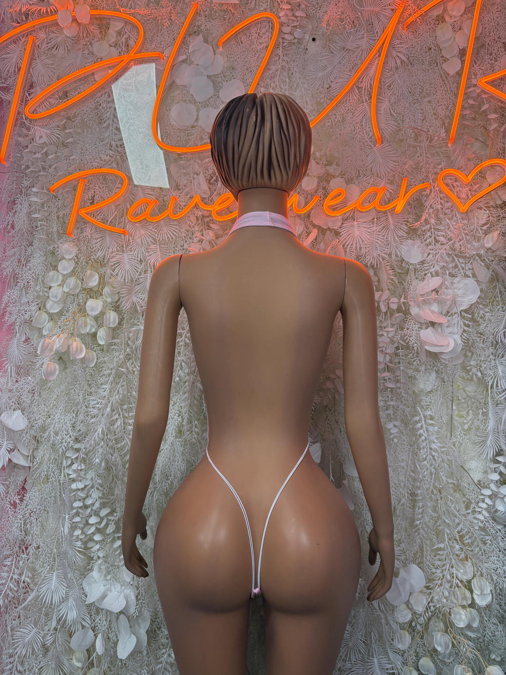 Pink halter bodysuit, open-back with thin back straps and V-shape bottom