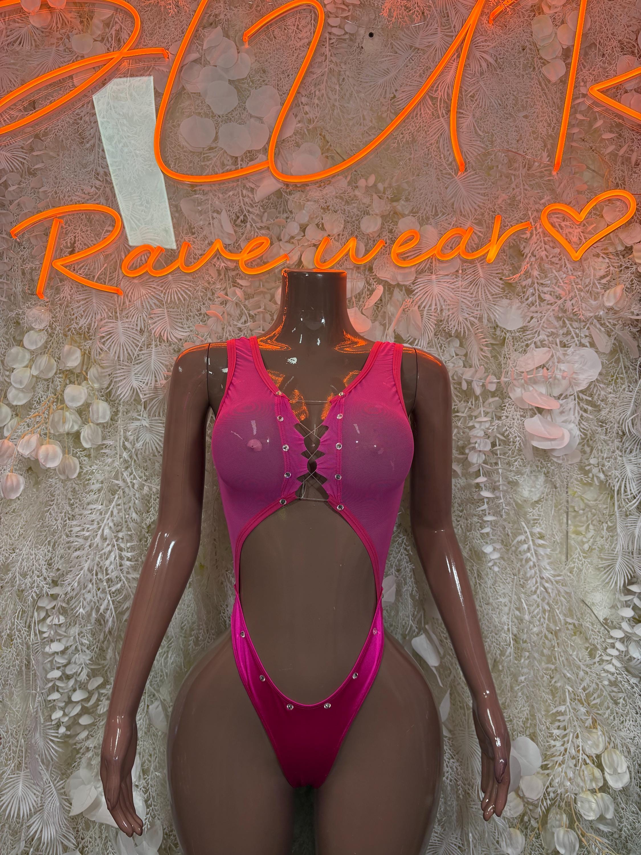 Pink one-piece bodysuit with sheer sleeves and button-front detail
