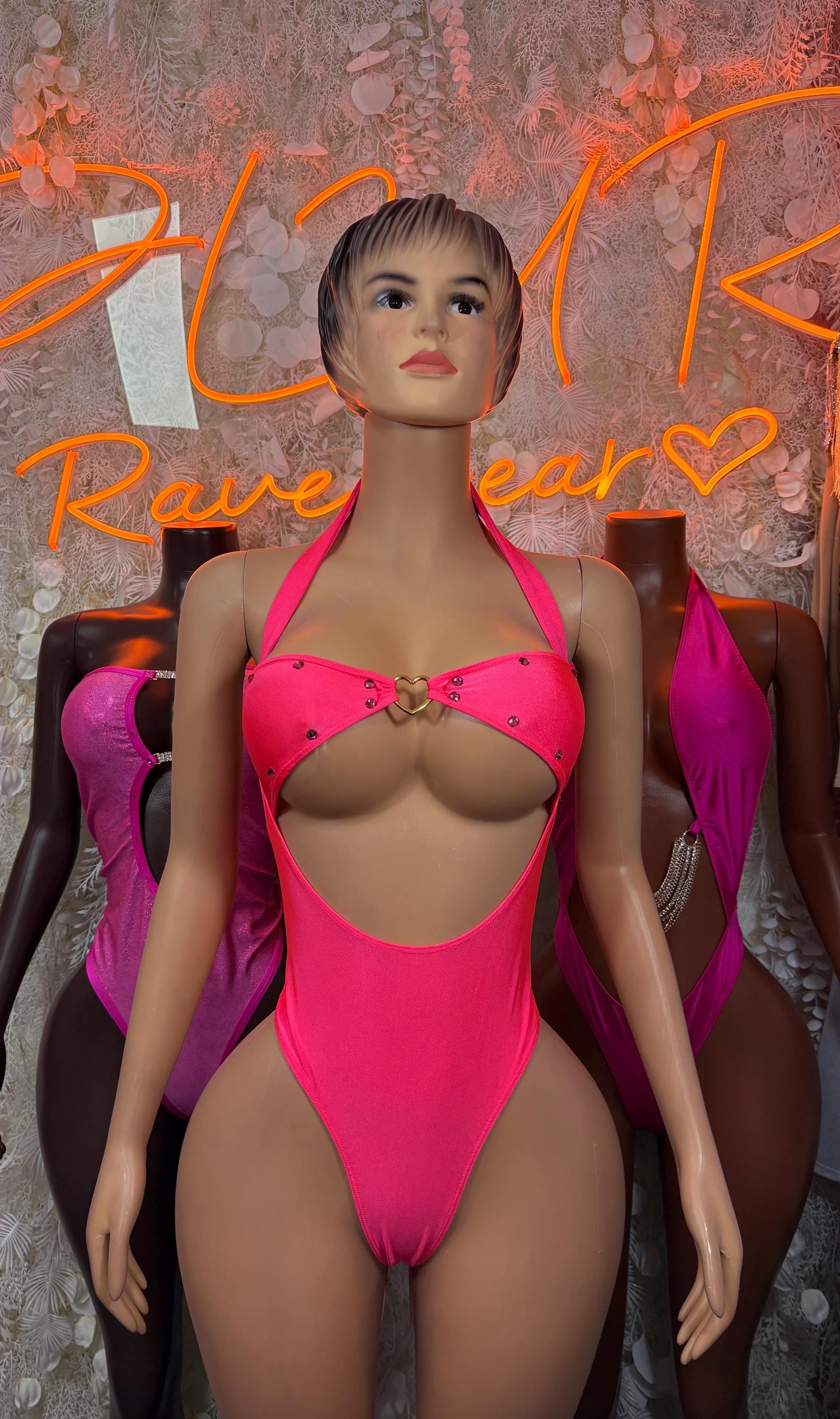 Hot pink one-piece bodysuit with underwired bra cups and center cutout front