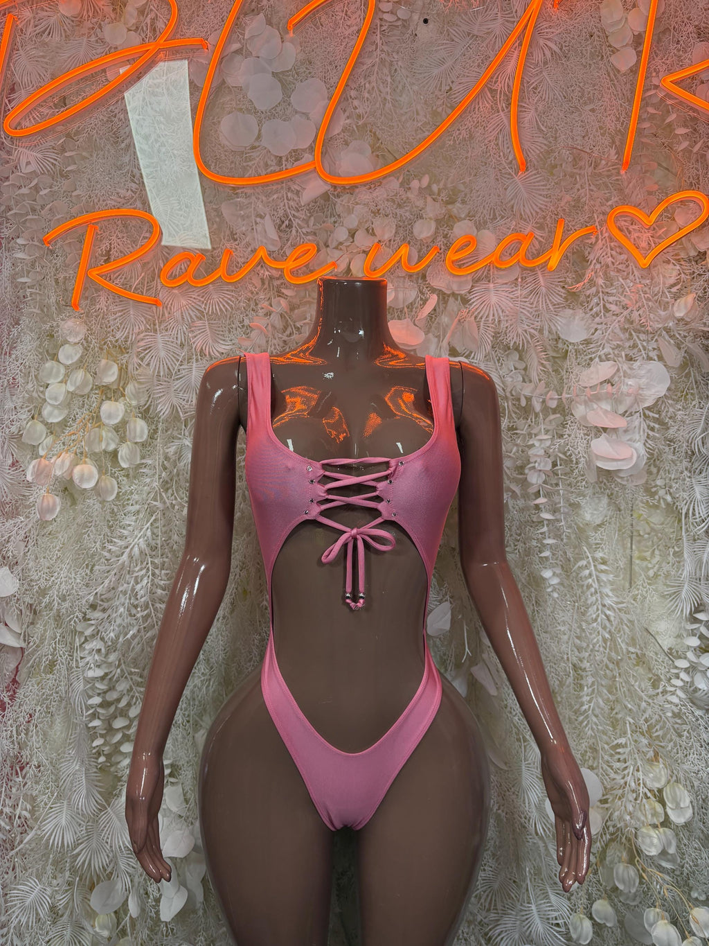 Pink lace-up one-piece bodysuit, scoop neck and tie front