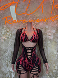 Red electric graphic one-piece bodysuit with sheer black sleeves and lace-up cutouts