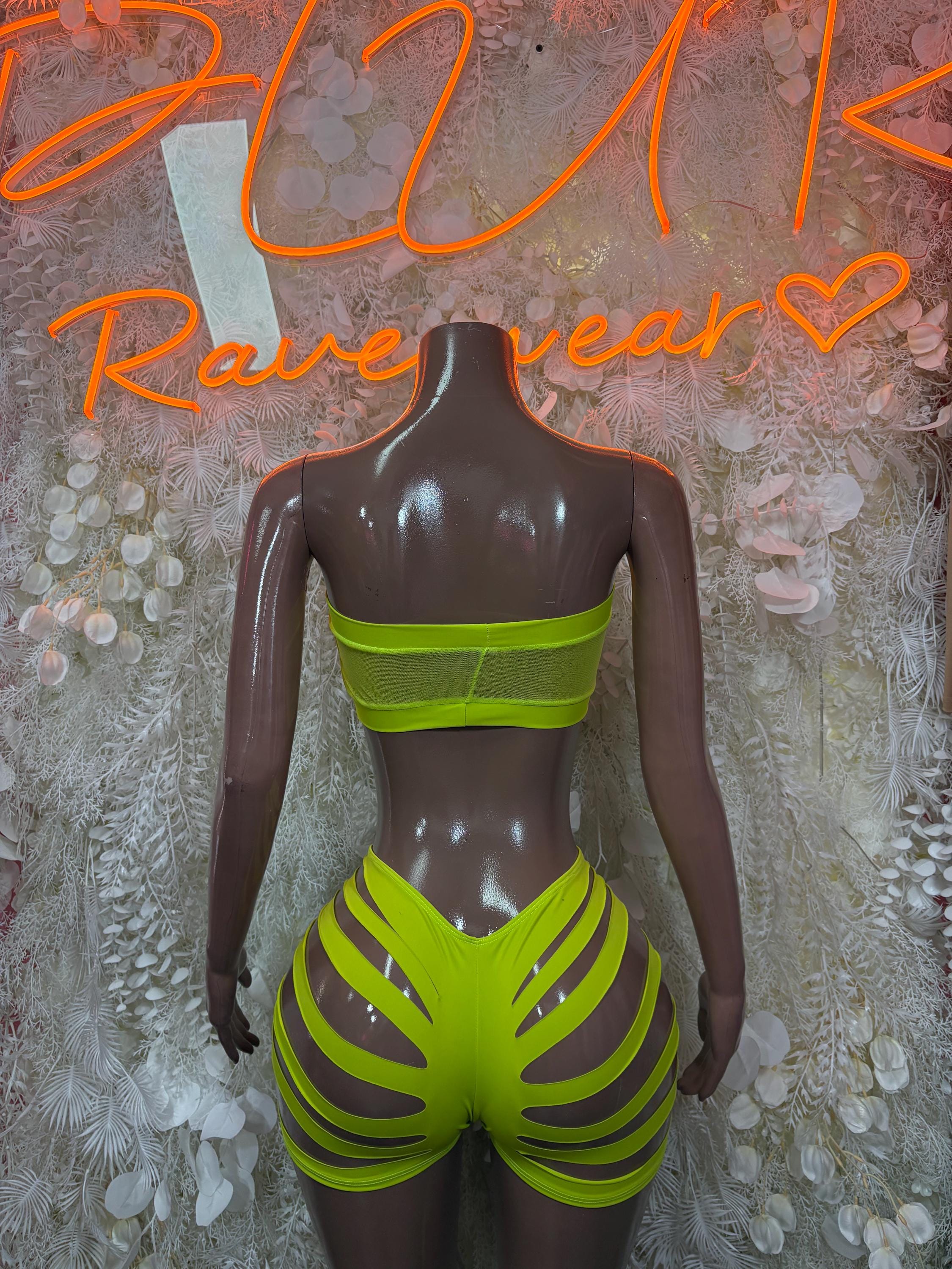 Lime green two-piece rave set with bandeau back top and high-cut shorts with slashed sides