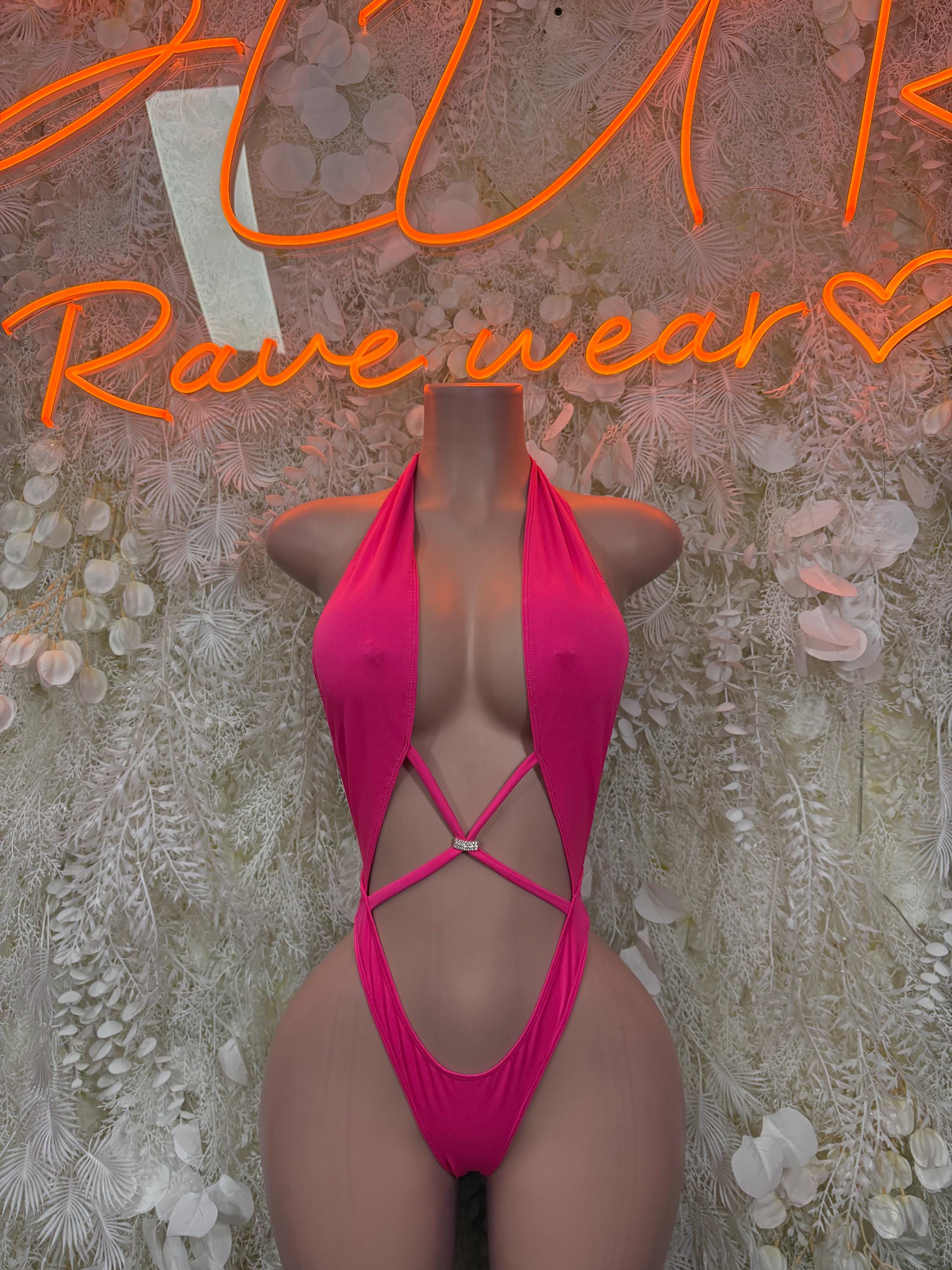 Pink one-piece bodysuit with halter neckline and crisscross back straps