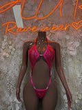 Pink metallic slingshot one-piece bodysuit with cutout bra-style top and thong bottom