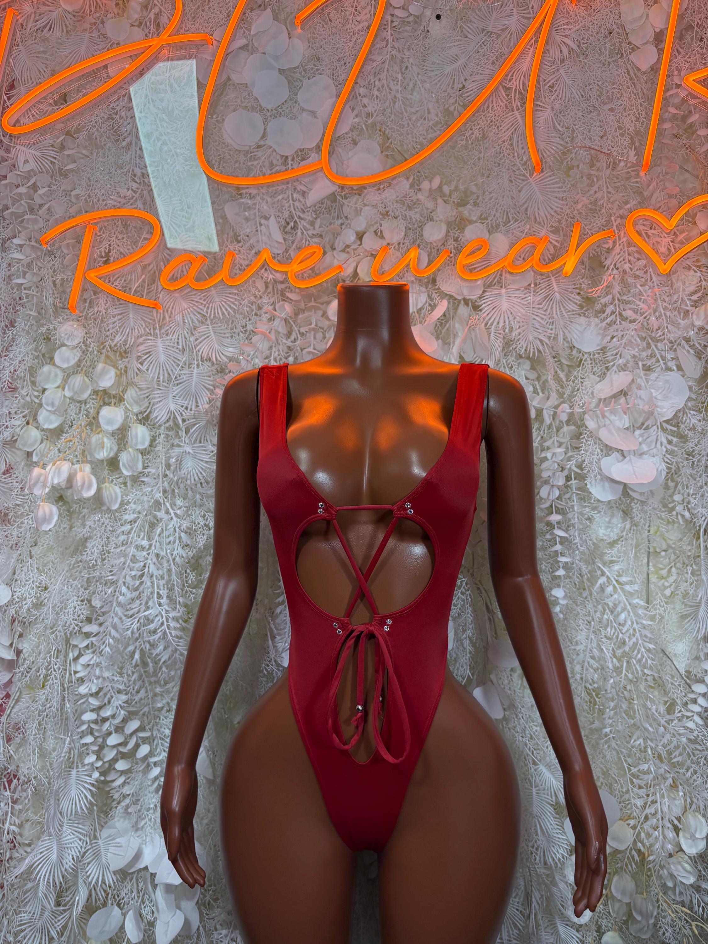 Red open-back bodysuit with crisscross tie detail at center back