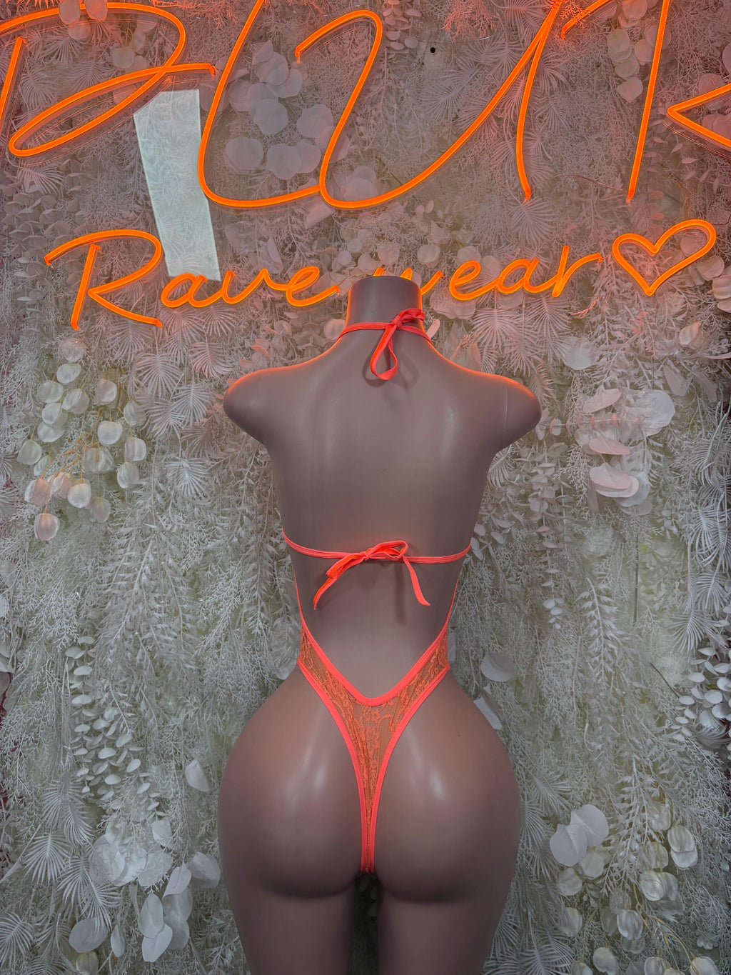 Orange lace backless bodysuit with halter strap ties and thin back straps