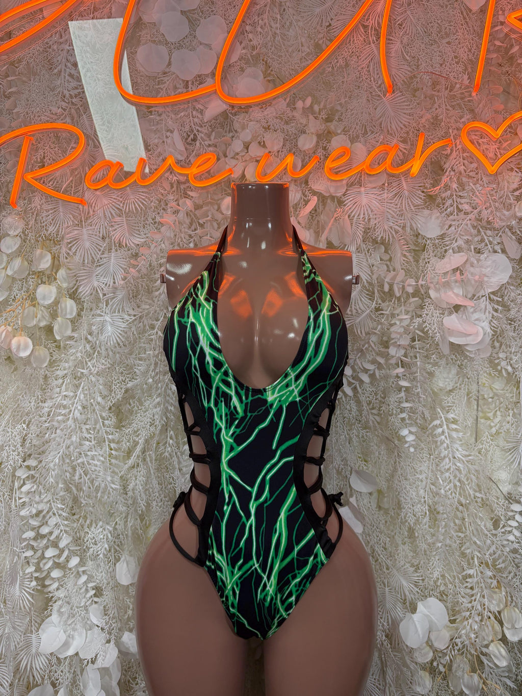 Bottlegirl one-piece bodysuit, black with neon green electric trim and halter straps