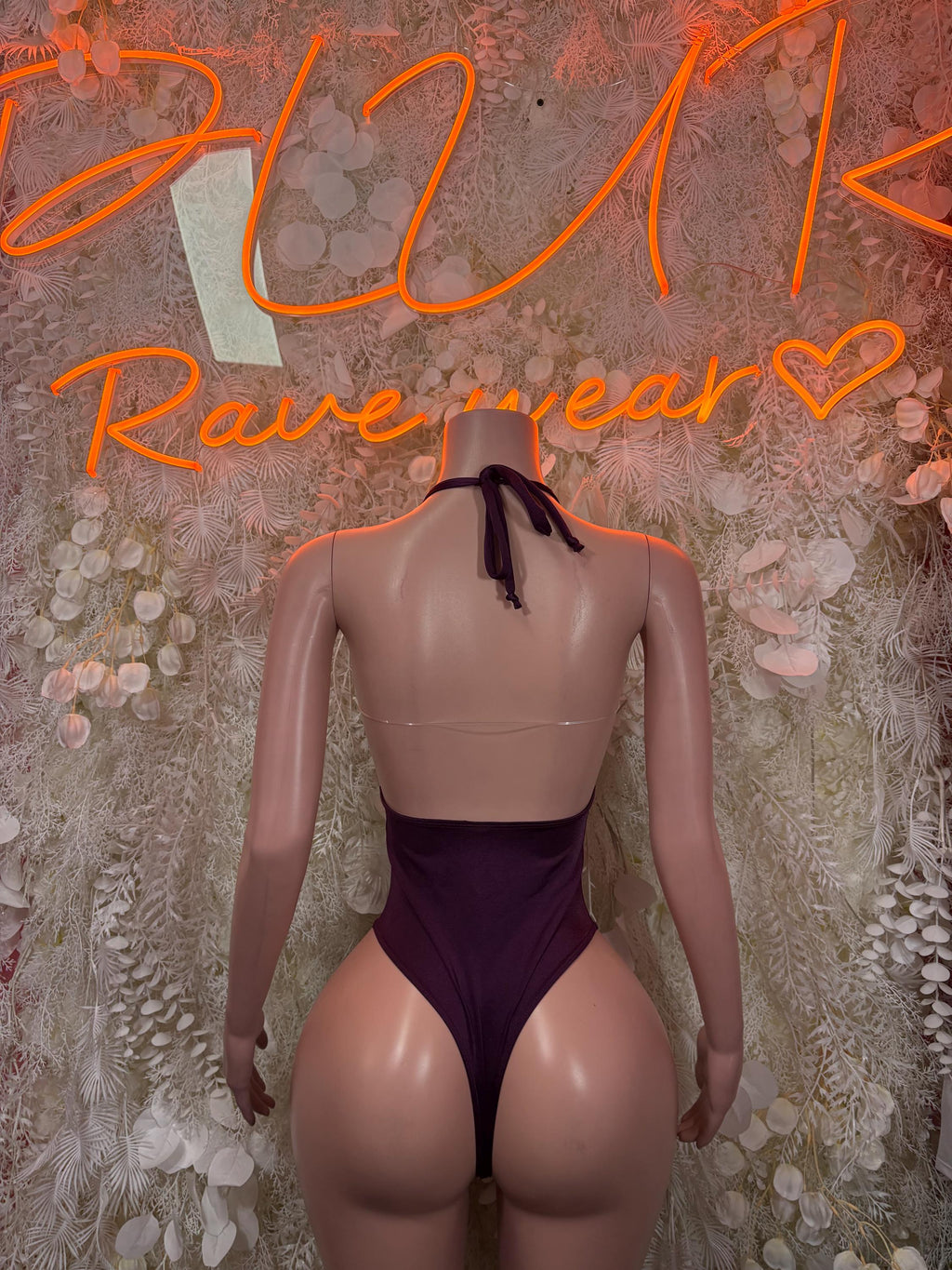 Burgundy velvet halter bodysuit with lace-tie neck and back keyhole