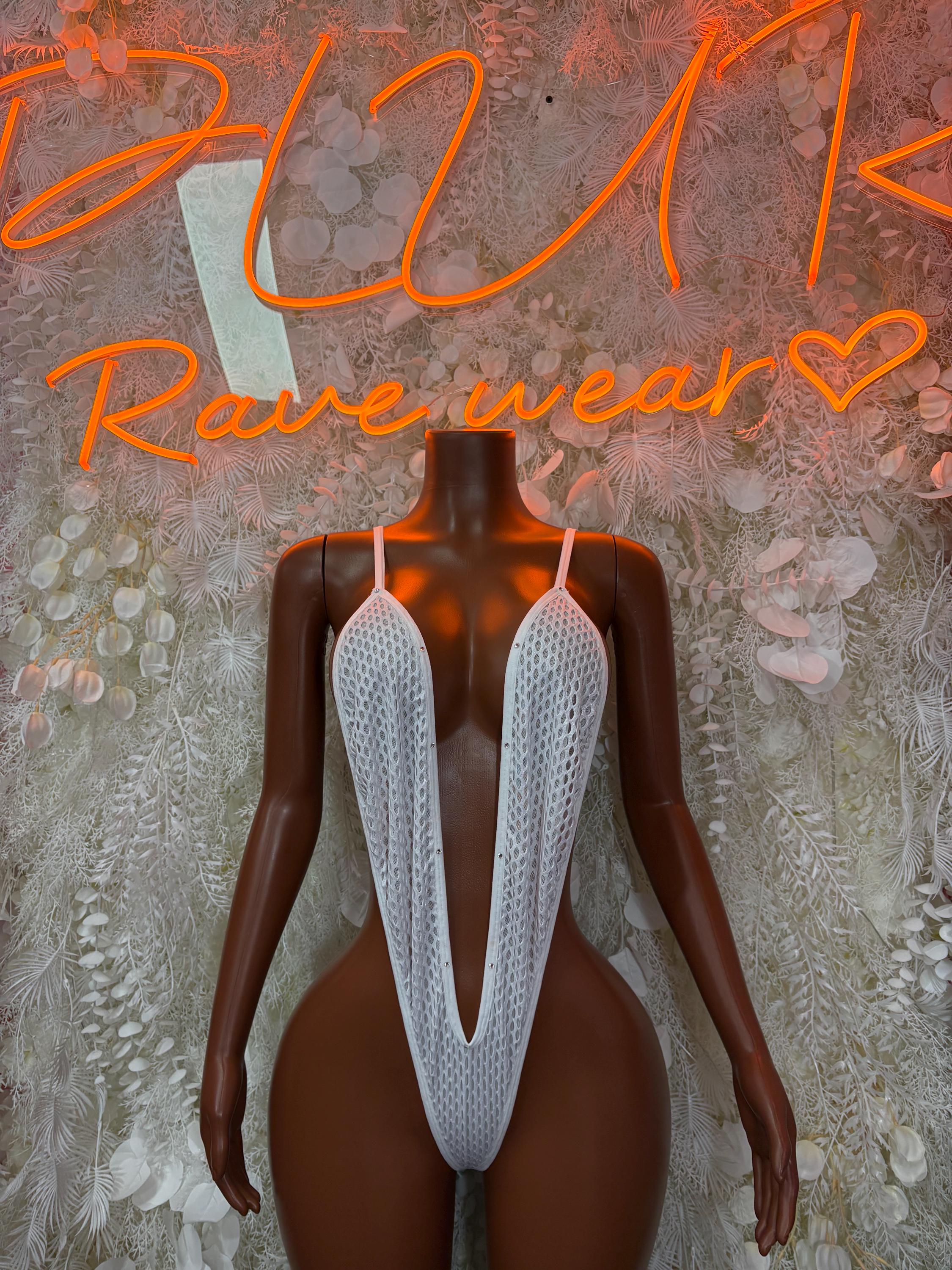 White fishnet one-piece with deep V back straps and halter neckline