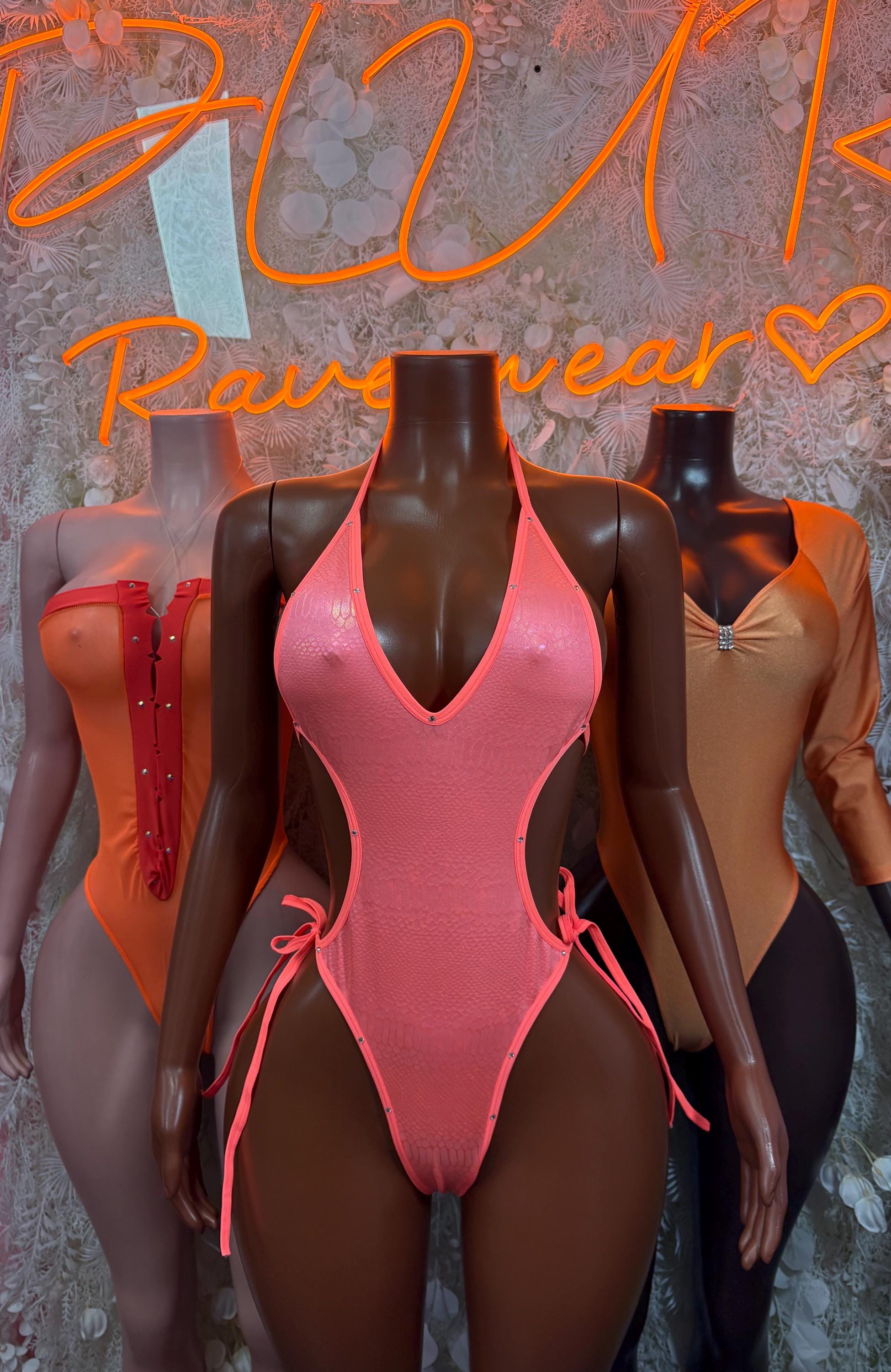 Pink mesh one-piece bodysuit with V-neck and side tie strings