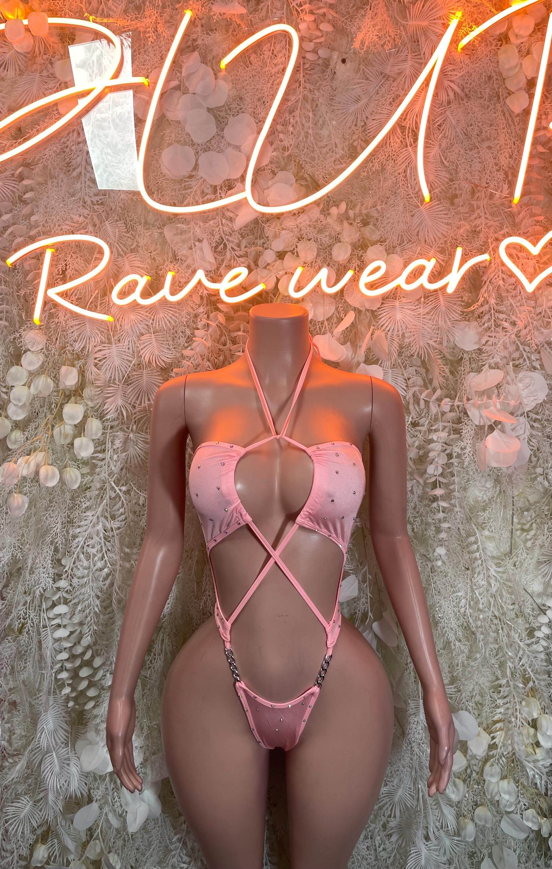 Pink rhinestone bodysuit with strappy crisscross front and thong back