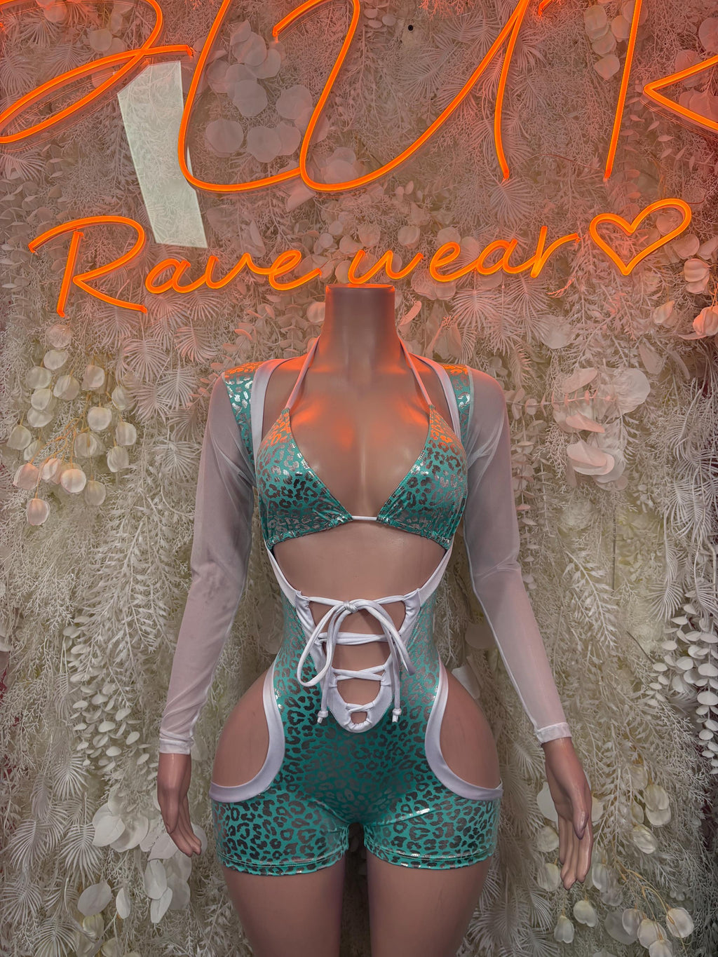 Teal cheetah-print bodysuit with white lace-up front and sheer long sleeves