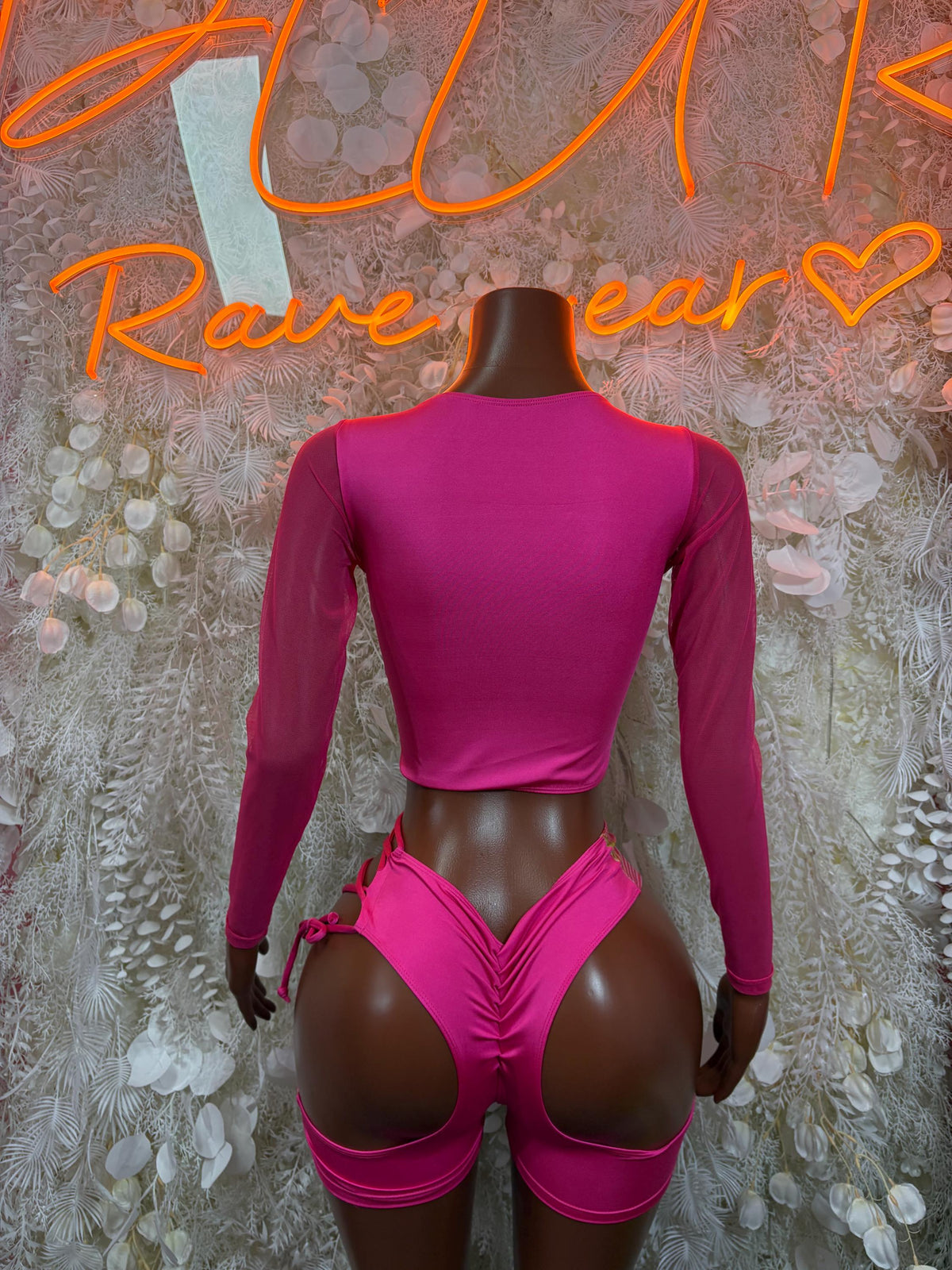 Pink metallic hologram dancewear set, long-sleeve crop top and strappy shorts back view