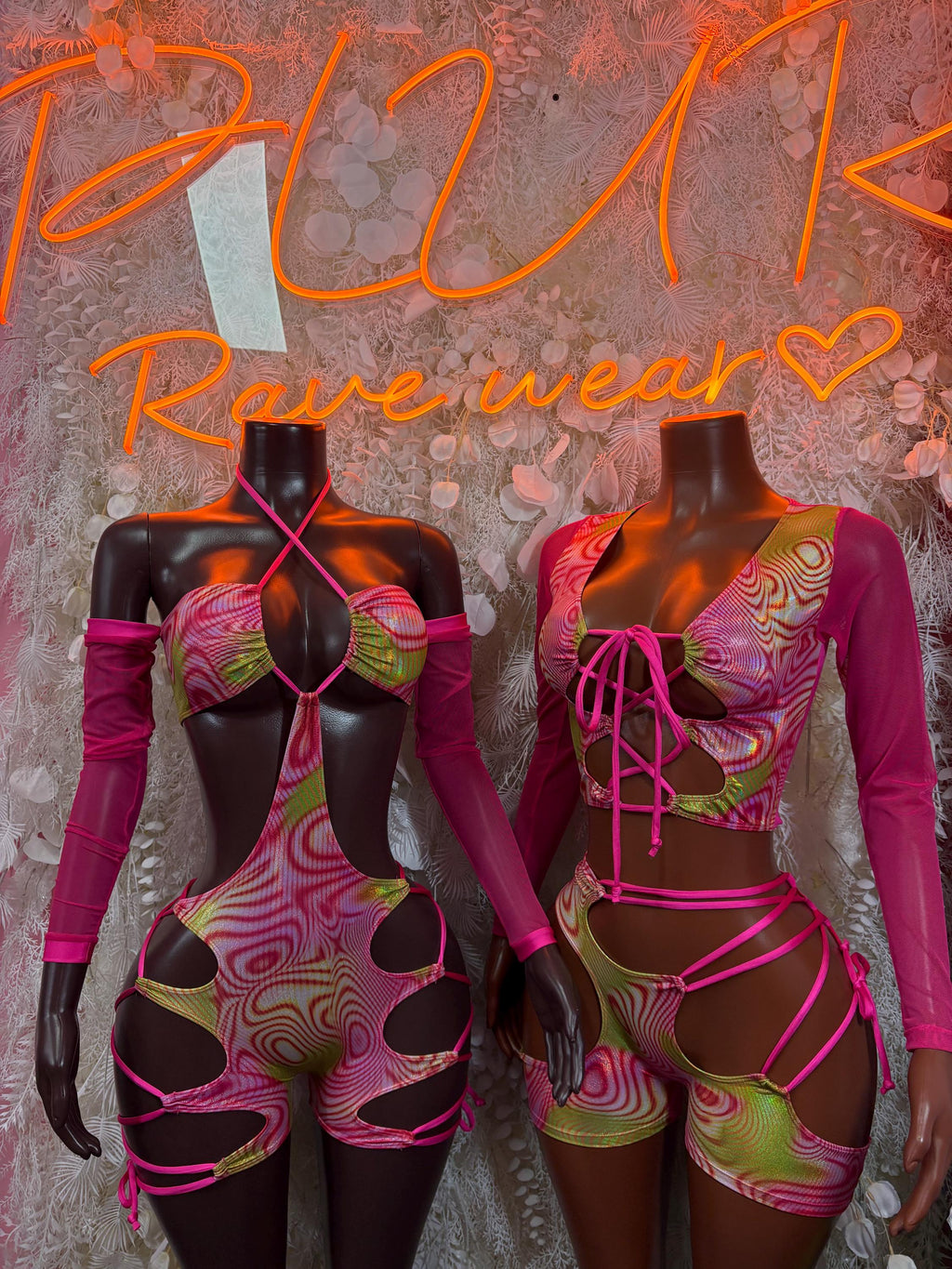 Pink metallic hologram dancewear set with lace-up corset top and layered cutout shorts, two angles