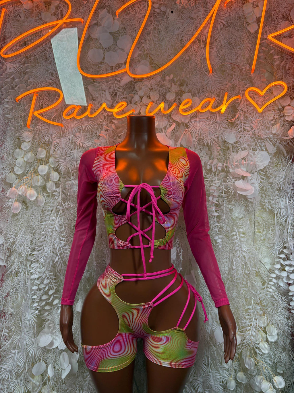 Pink metallic hologram dancewear set with lace-up long-sleeve top and cutout shorts