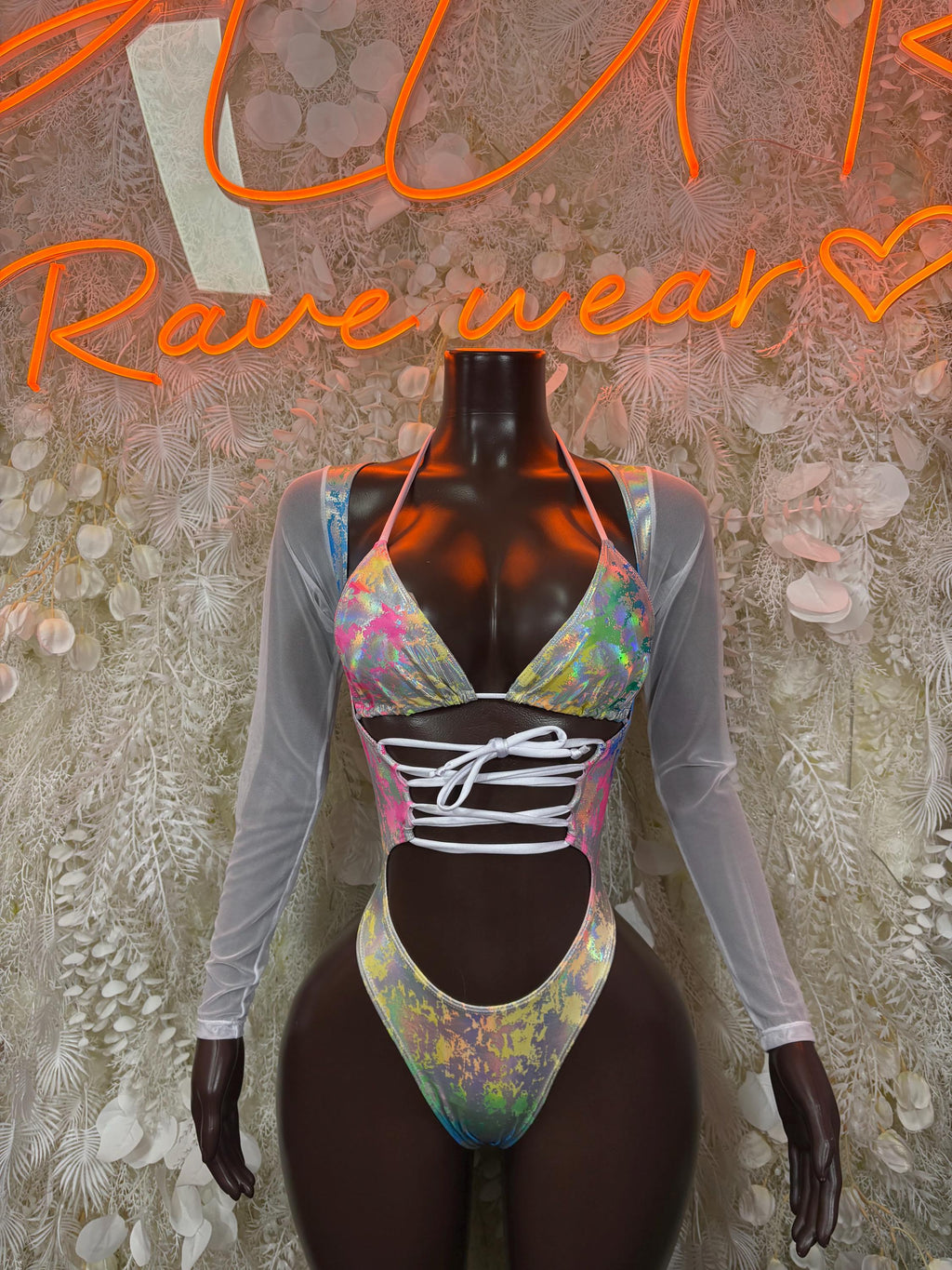 Holographic rainbow metallic dance bodysuit with long sleeves and lace-up front