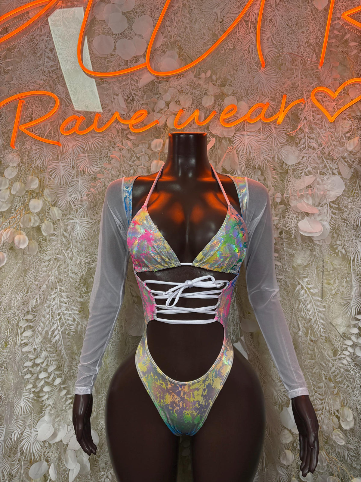 Holographic rainbow metallic dance bodysuit with long sleeves and lace-up front