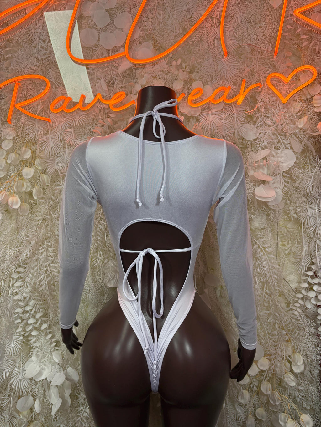 Rainbow hologram thong bodysuit back with high-cut openings and white lace-up ties