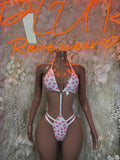 Heart-print micro bikini set with triangle top and cheeky bottom, pink with white trim