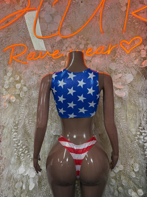 Two-piece bikini with blue star triangle top and red-white striped high-cut bottoms