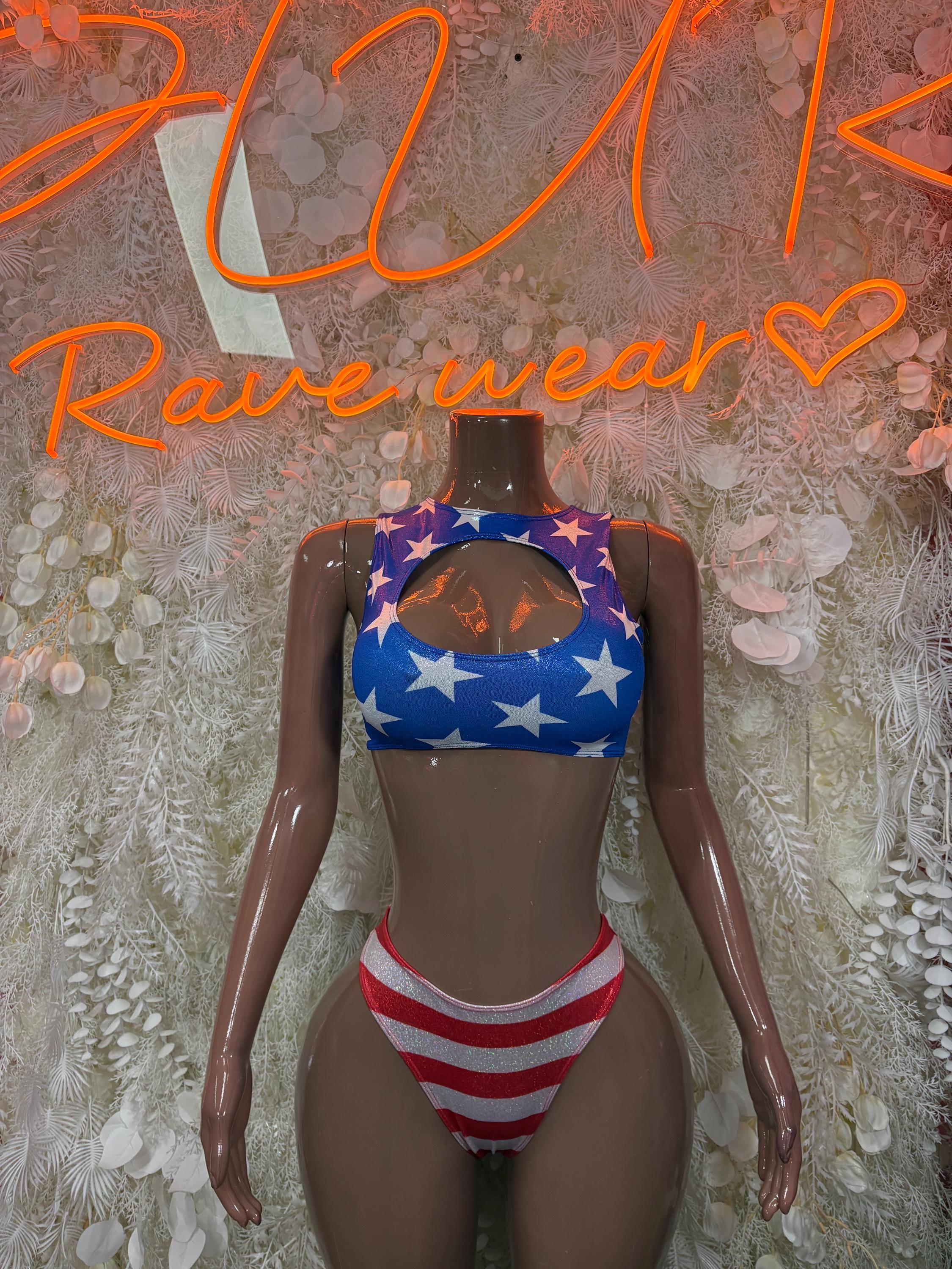 Two-piece bikini with blue star triangle top and red-white striped bottoms
