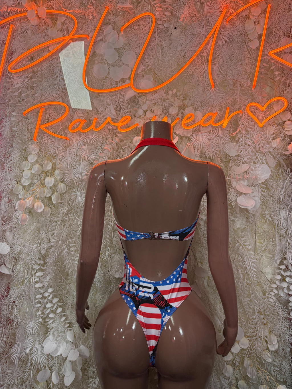 Women’s patriotic one-piece swimsuit, stars-and-stripes back with tie at center