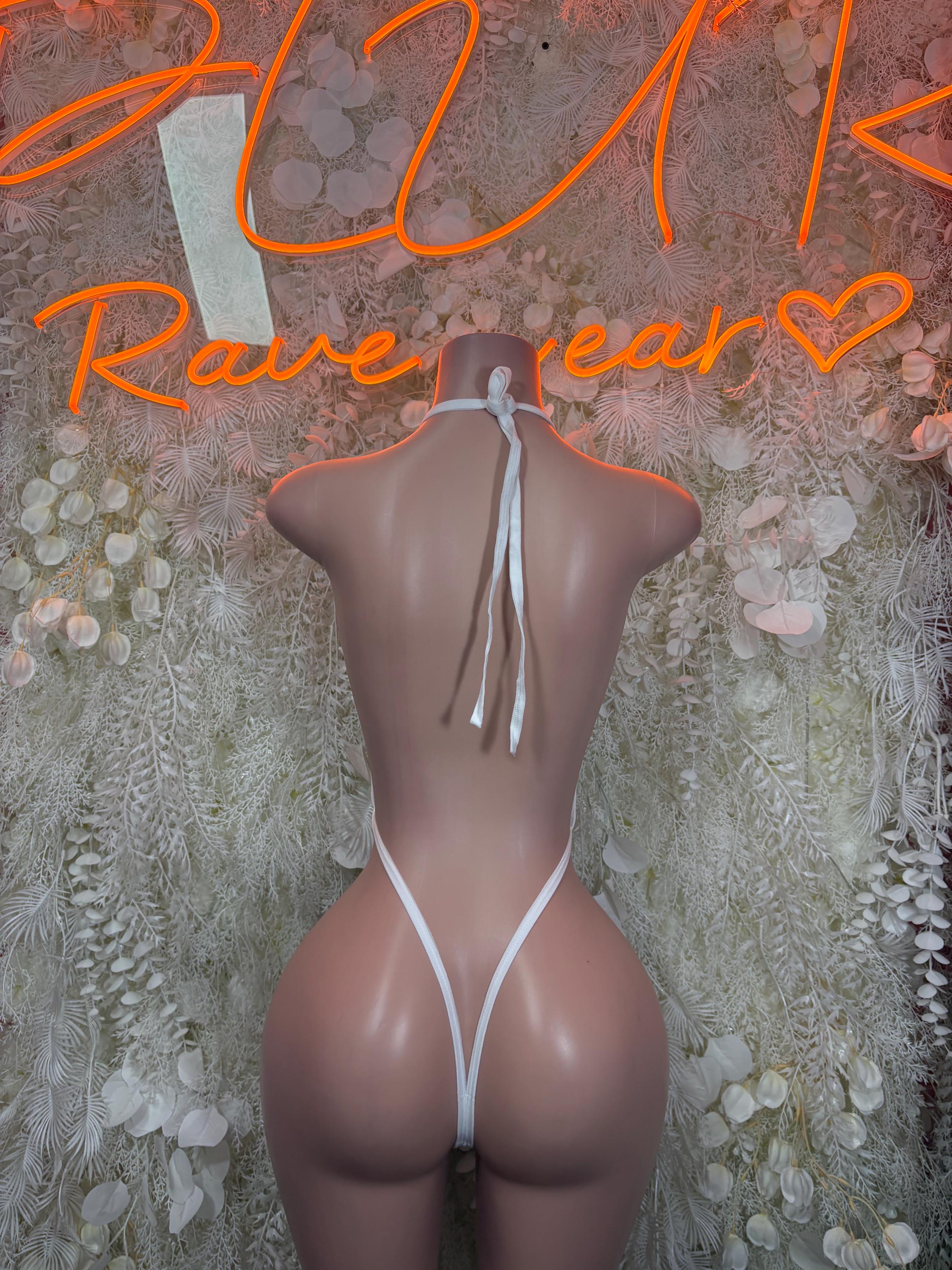 White lace festival bodysuit with open back and lace-up tie straps