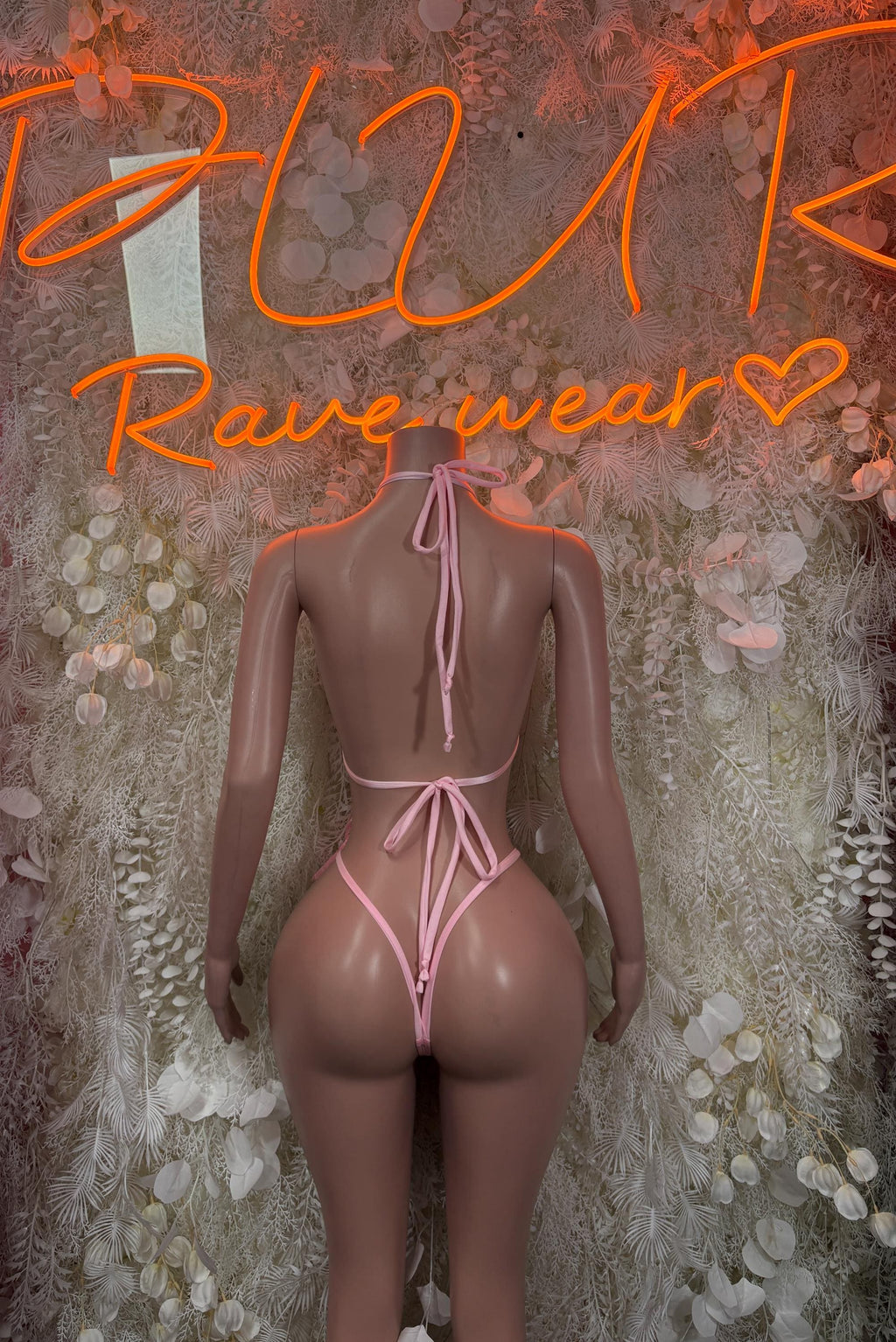 Pink lace ruffle bikini: back view with tie-string closure