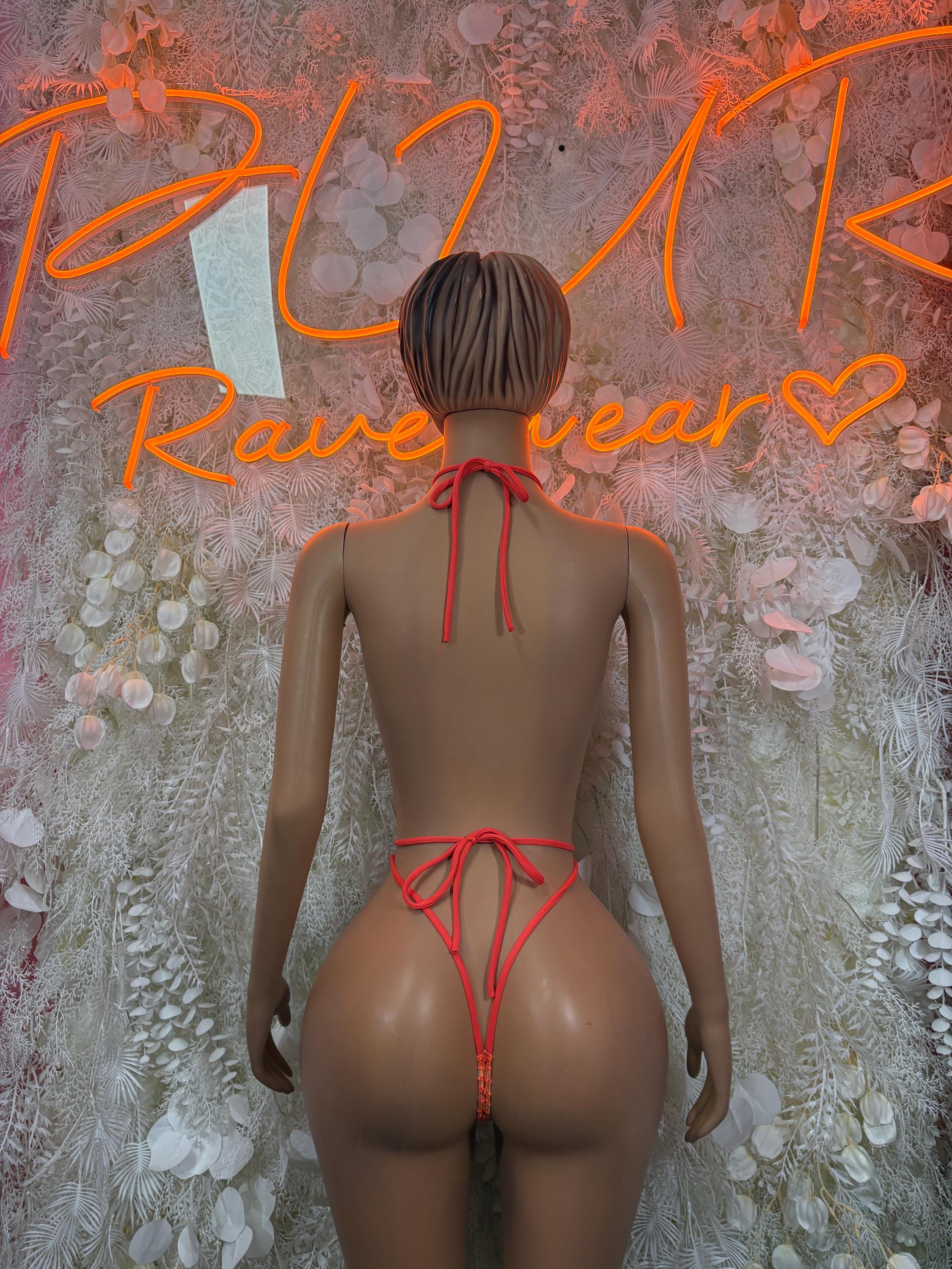 Orange fishnet one-piece bodysuit with open back ties and string thong back