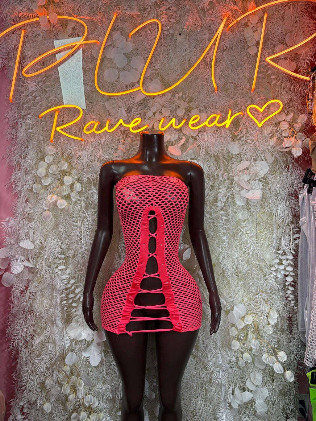 Pink fishnet mini dress with lace-up panel front and halter straps