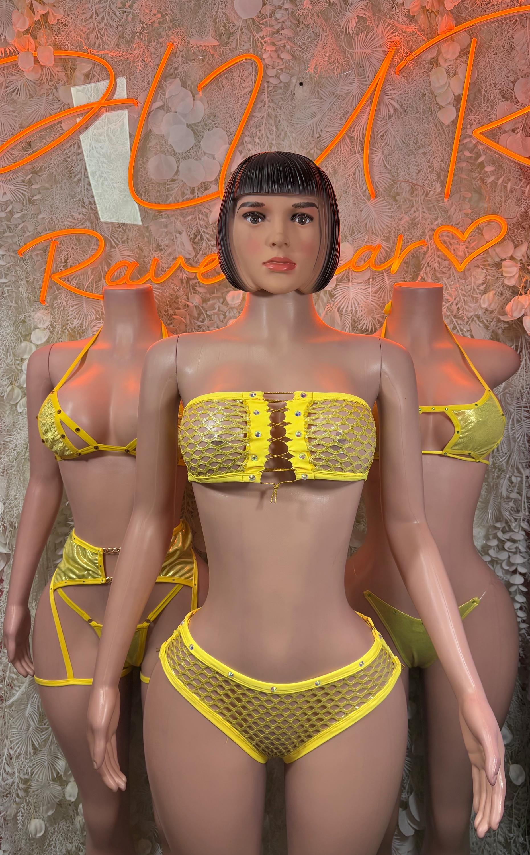 Yellow textured two-piece rave outfit with bandeau-style top and high-cut bottoms