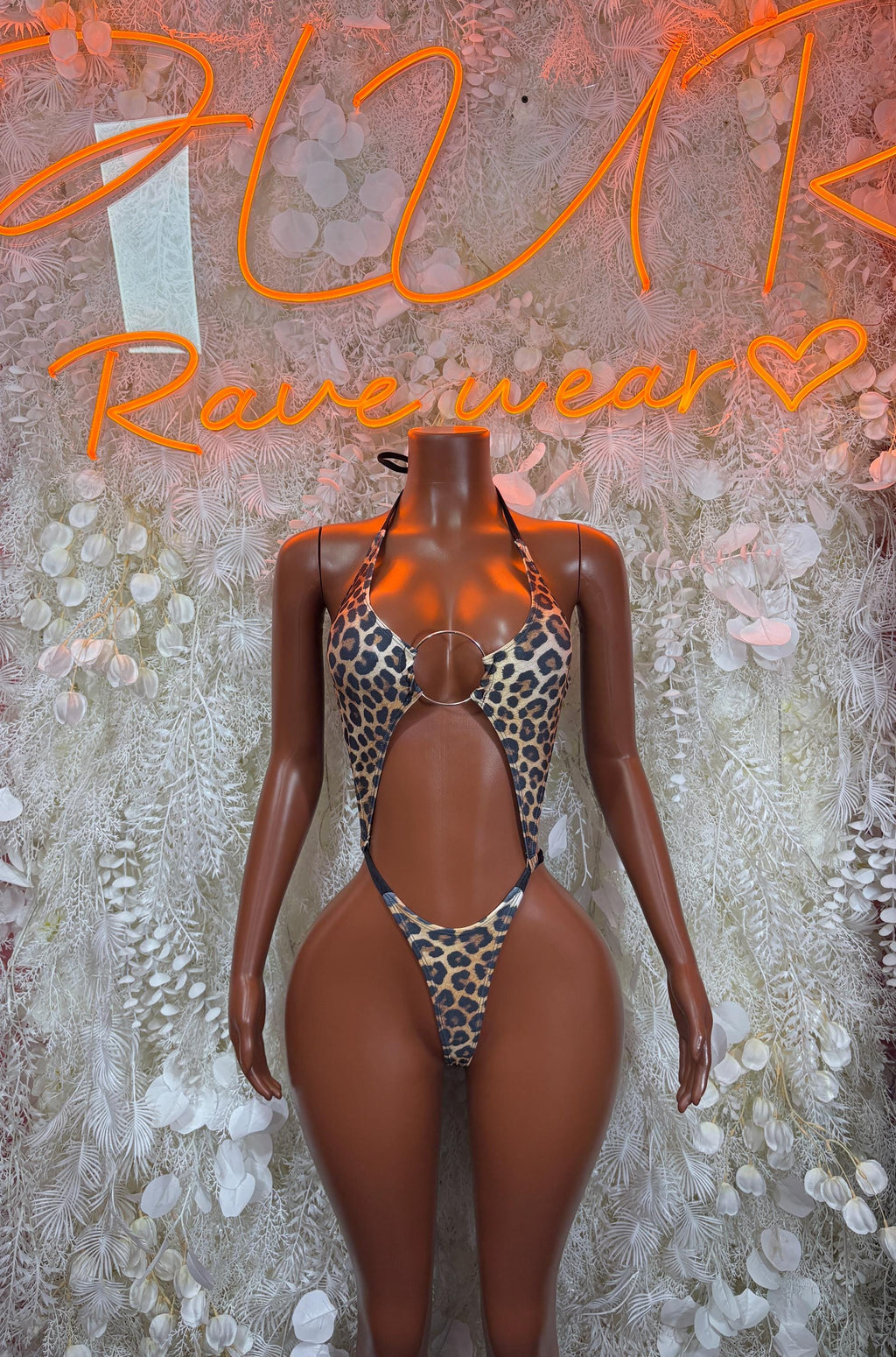 Leopard print slingshot thong set with halter straps and ring-front cutout