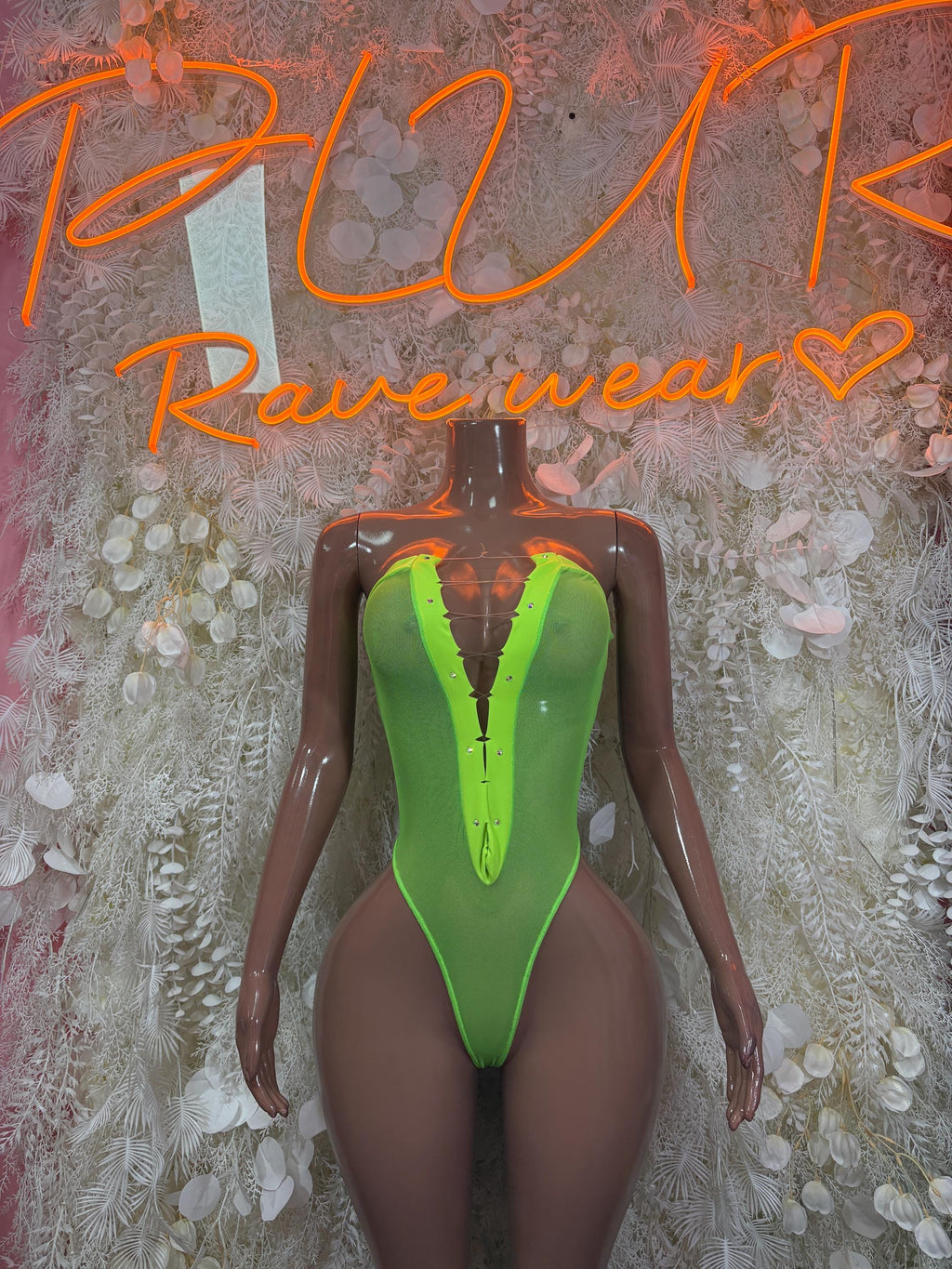 Neon green V-neck one-piece bodysuit with sheer long sleeves