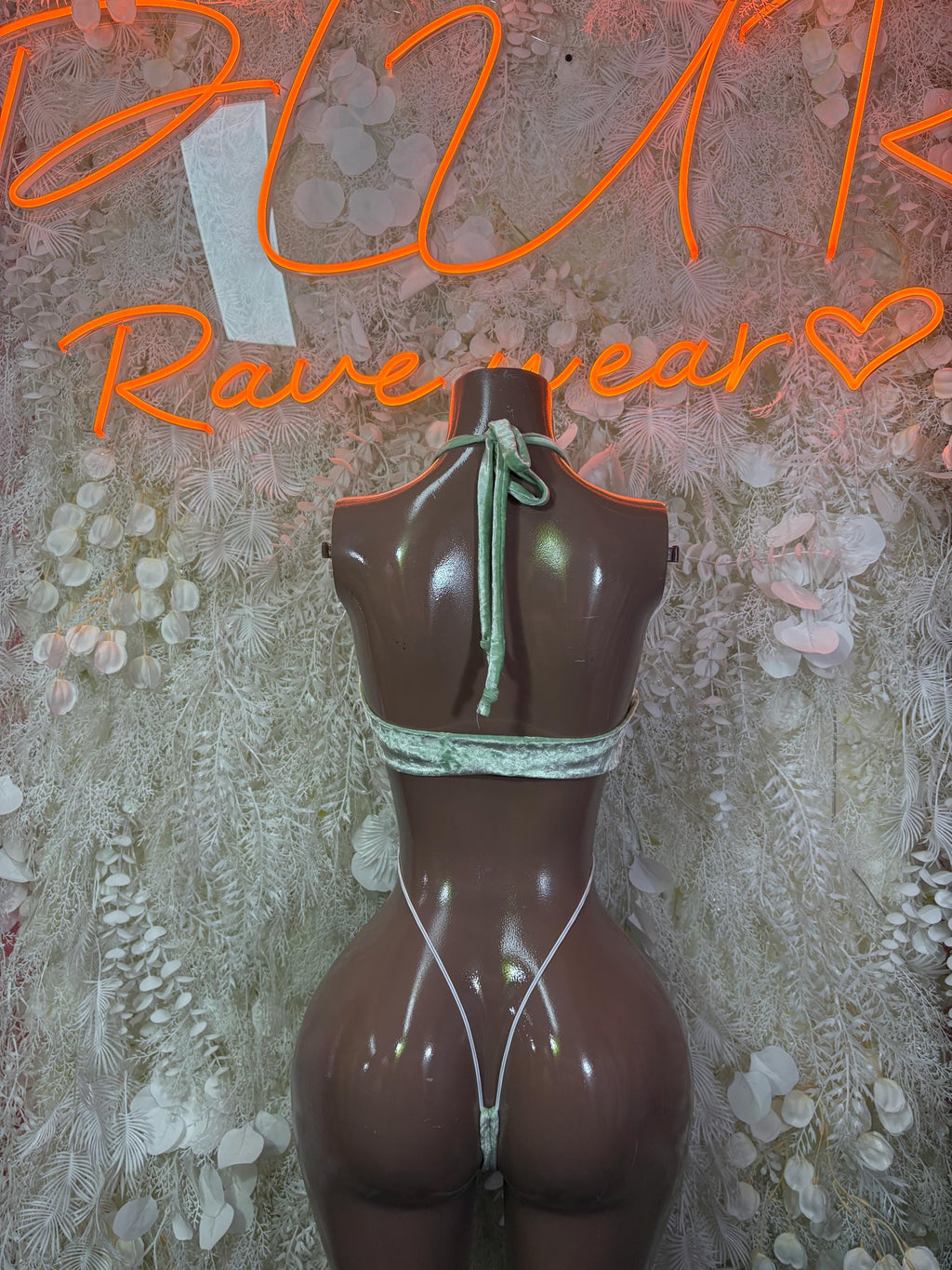 Mint green velvet one-piece bodysuit, back view with halter tie and V-shaped back