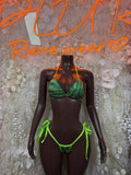 Green metallic bikini set with neon straps, triangle top and tie-side bottom on mannequin