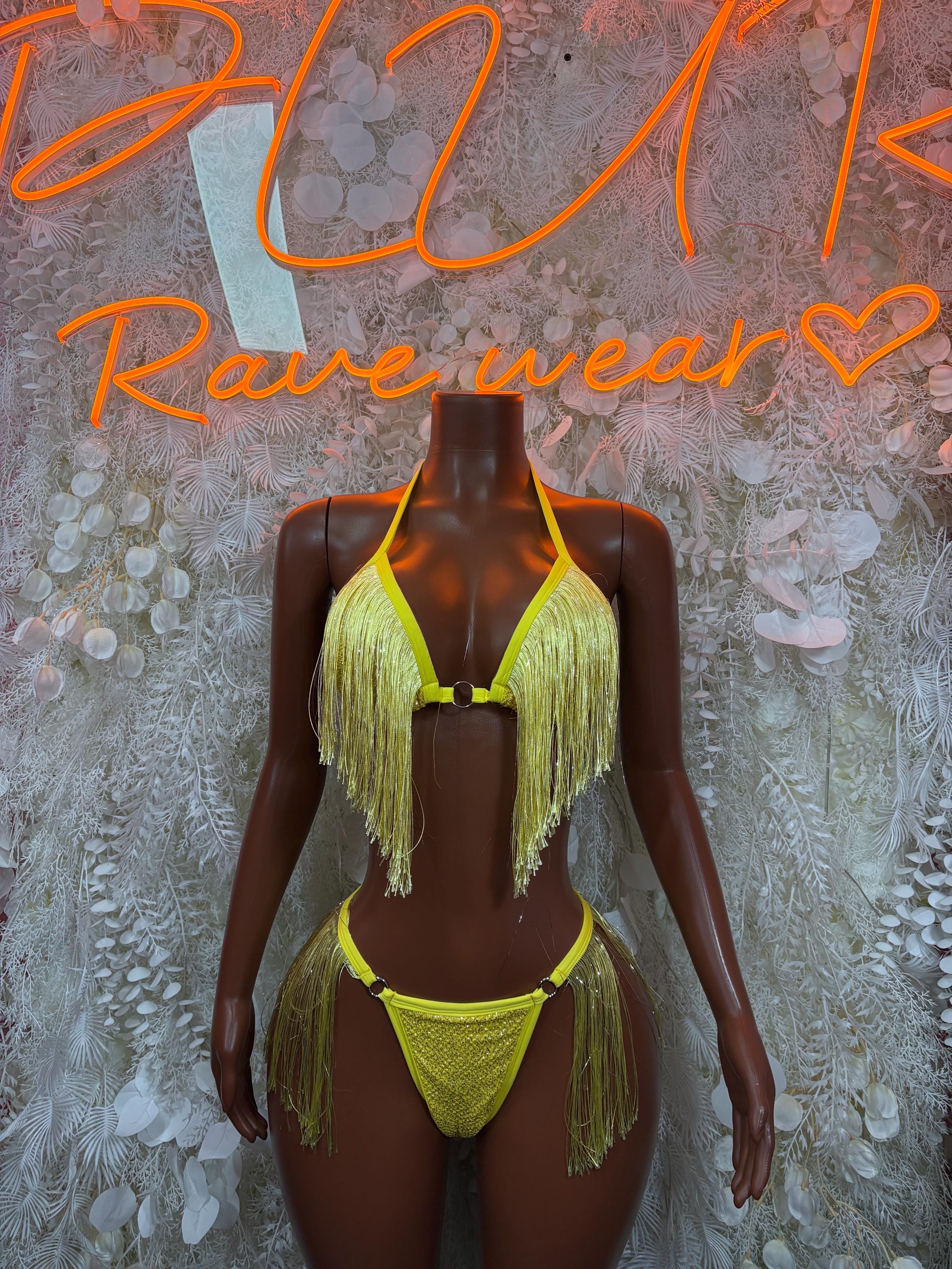 Yellow fringe bodysuit with halter top and matching thong bottoms, tassel trim