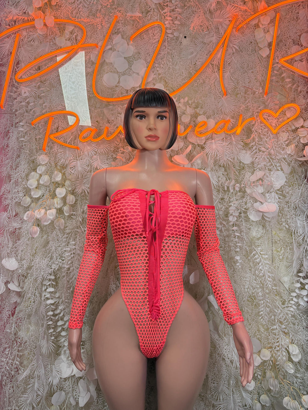 Coral fishnet bodysuit with off-shoulder cut and front zip, long sleeves