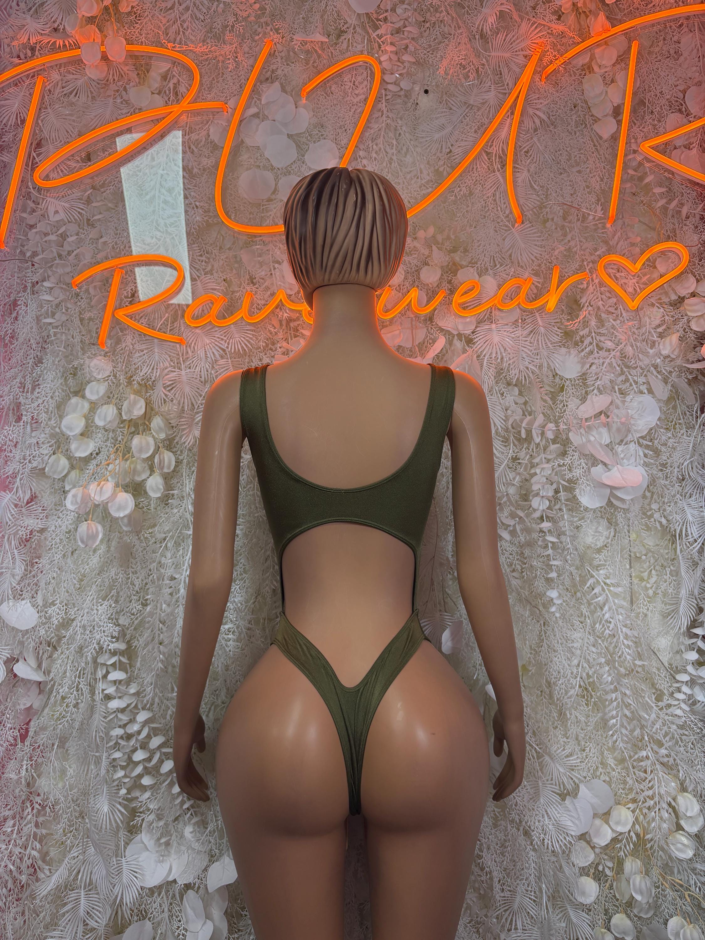 Green backless bodysuit with halter straps and open-back cutout