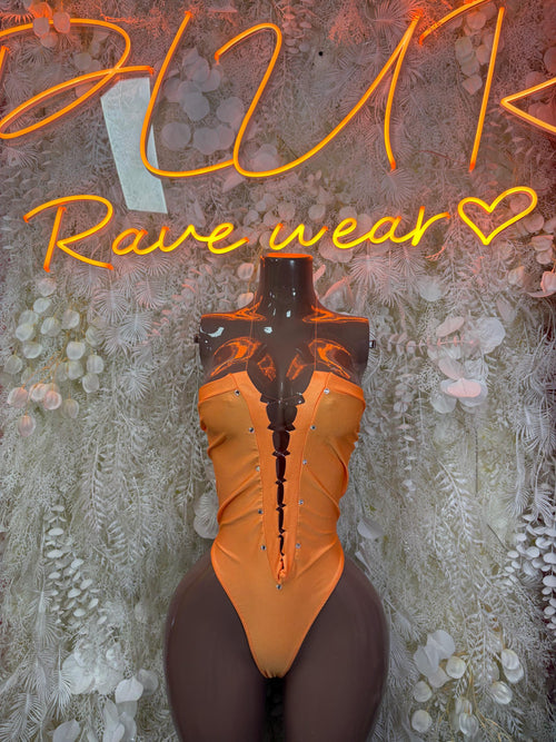 Orange one-piece bodysuit with deep V front and black sheer side panels