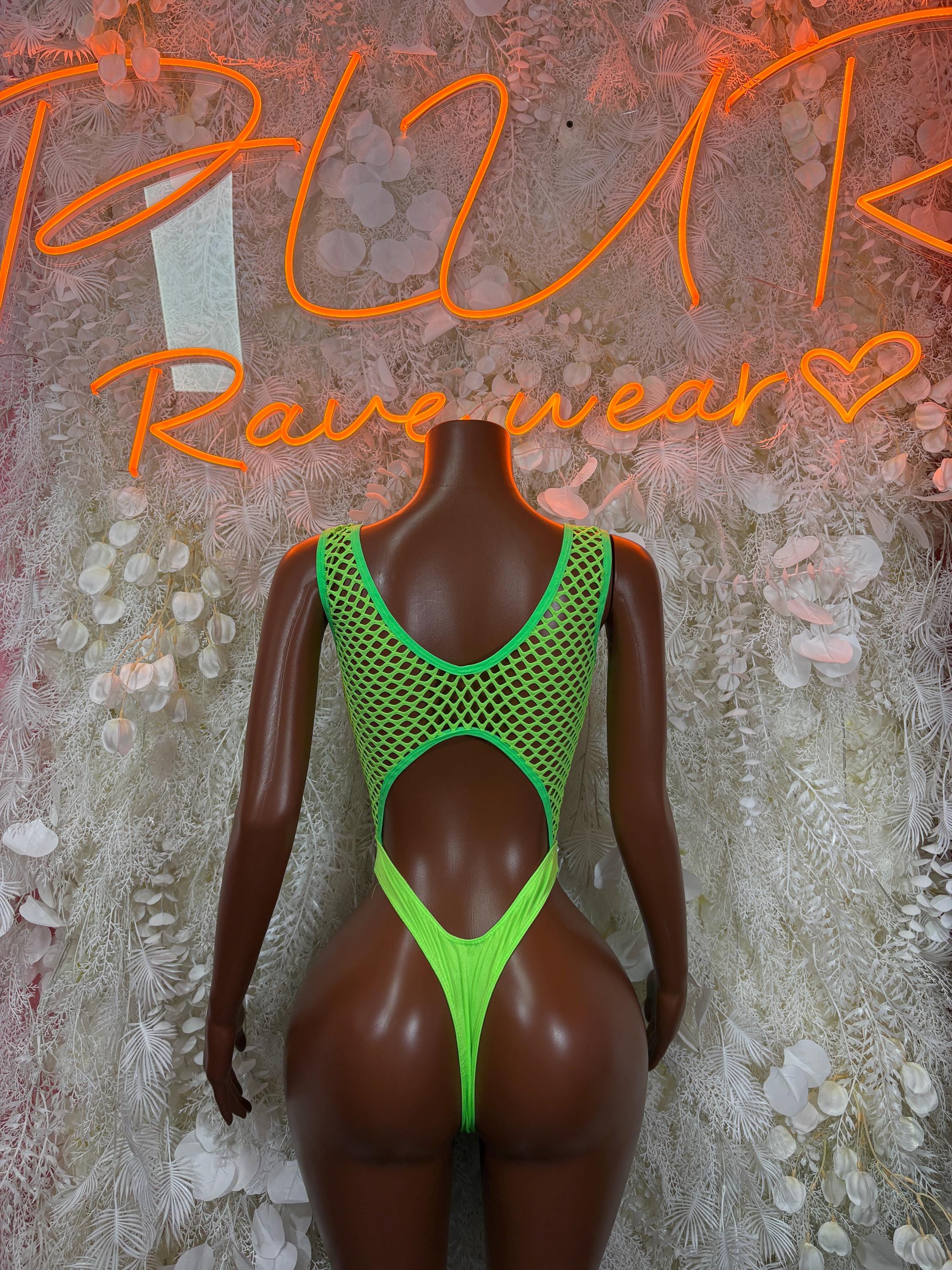 Green fishnet bodysuit with open back and crisscross lower cutout