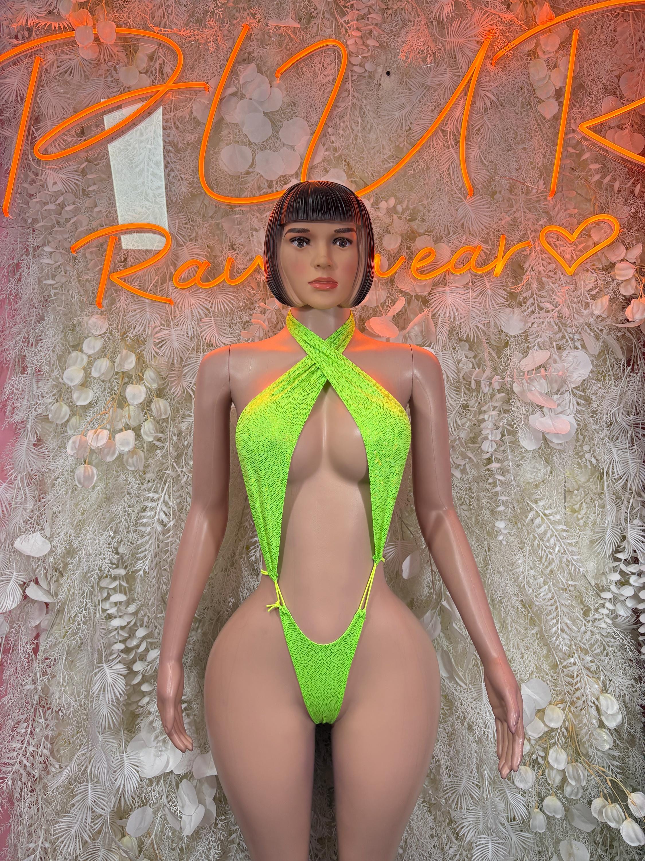 Neon green slingshot bodysuit with halter neckline and central keyhole cutout