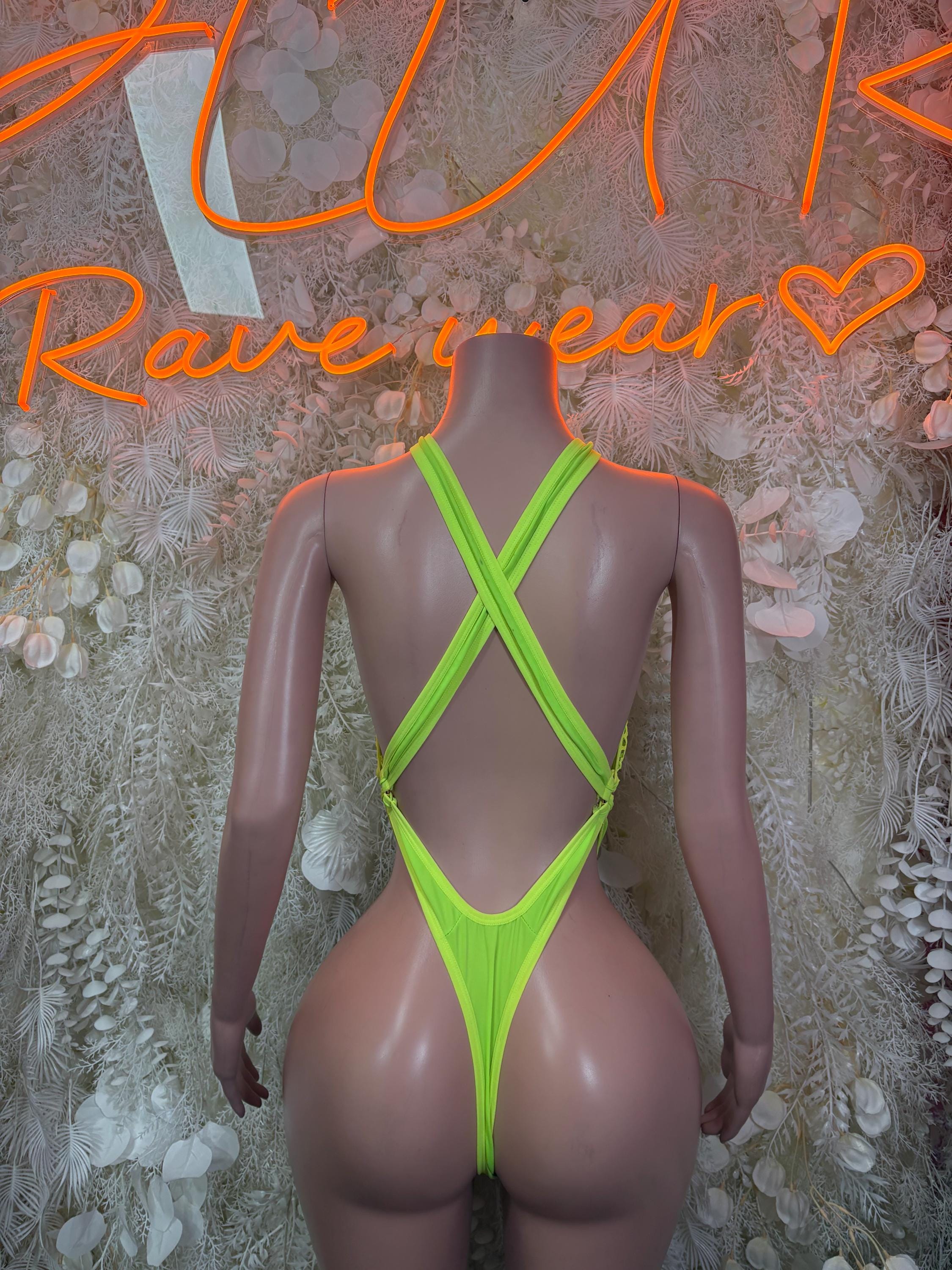 Neon green fishnet bodysuit, X-back straps and high-cut brief leg openings