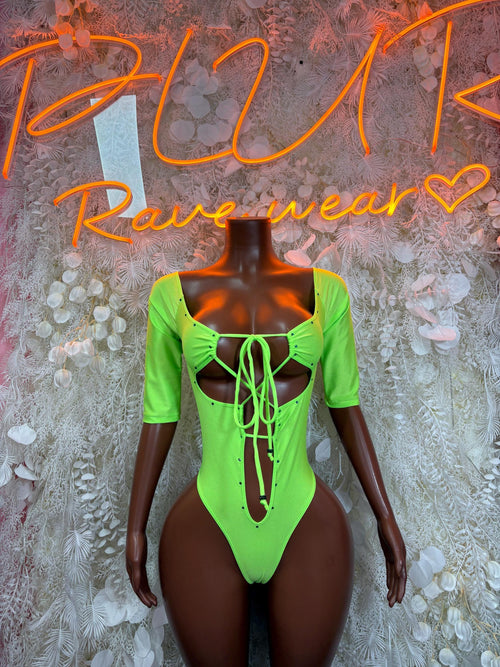 Neon green long-sleeve bodysuit with open back and center lace-up tie detail
