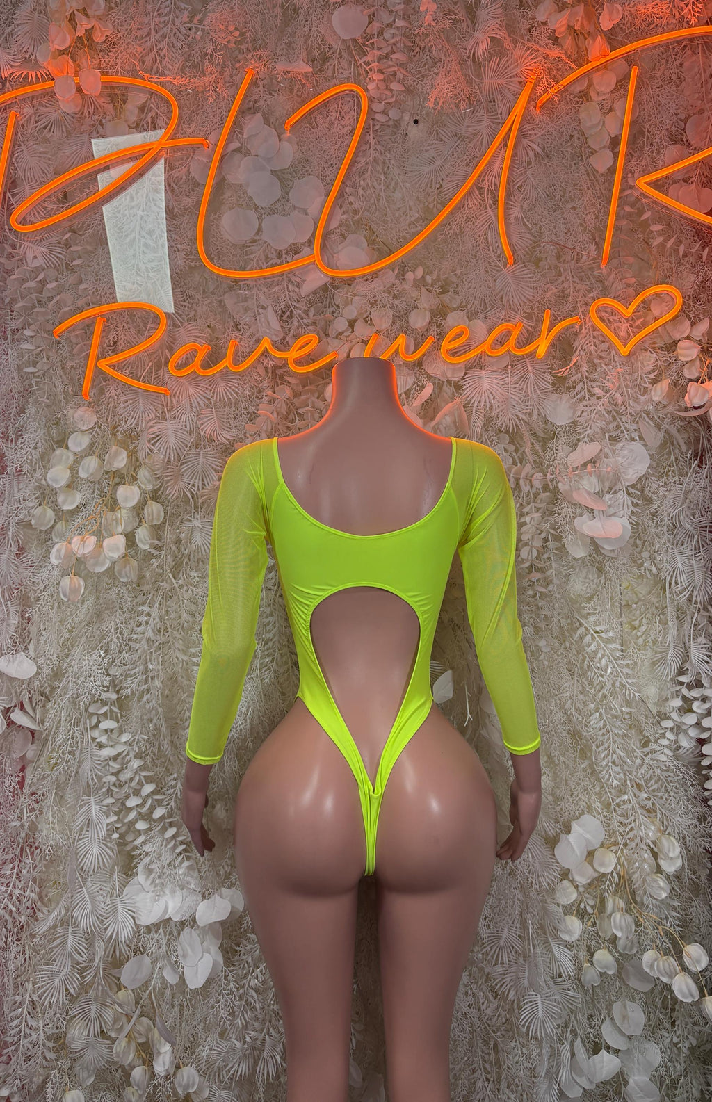 Neon green long-sleeve bodysuit with deep V front cutout