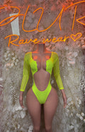Neon green long-sleeve bodysuit with deep V front cutout and thong bottom